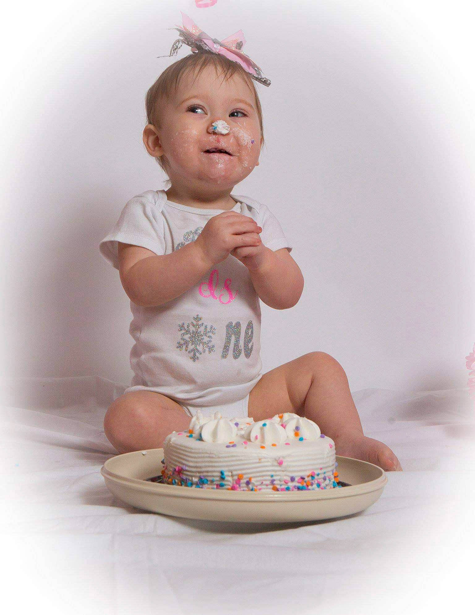 Raelee is registered to the contest to win money with this photo: child, eating, infant, person, play, product, sitting, toddler