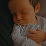 baby, sleeping, infant, hands, face, closeup, skin, hair, cozy, soft_light, peaceful, newborn, clothing, portrait, rest, child, cute, warm, comfort, toddler