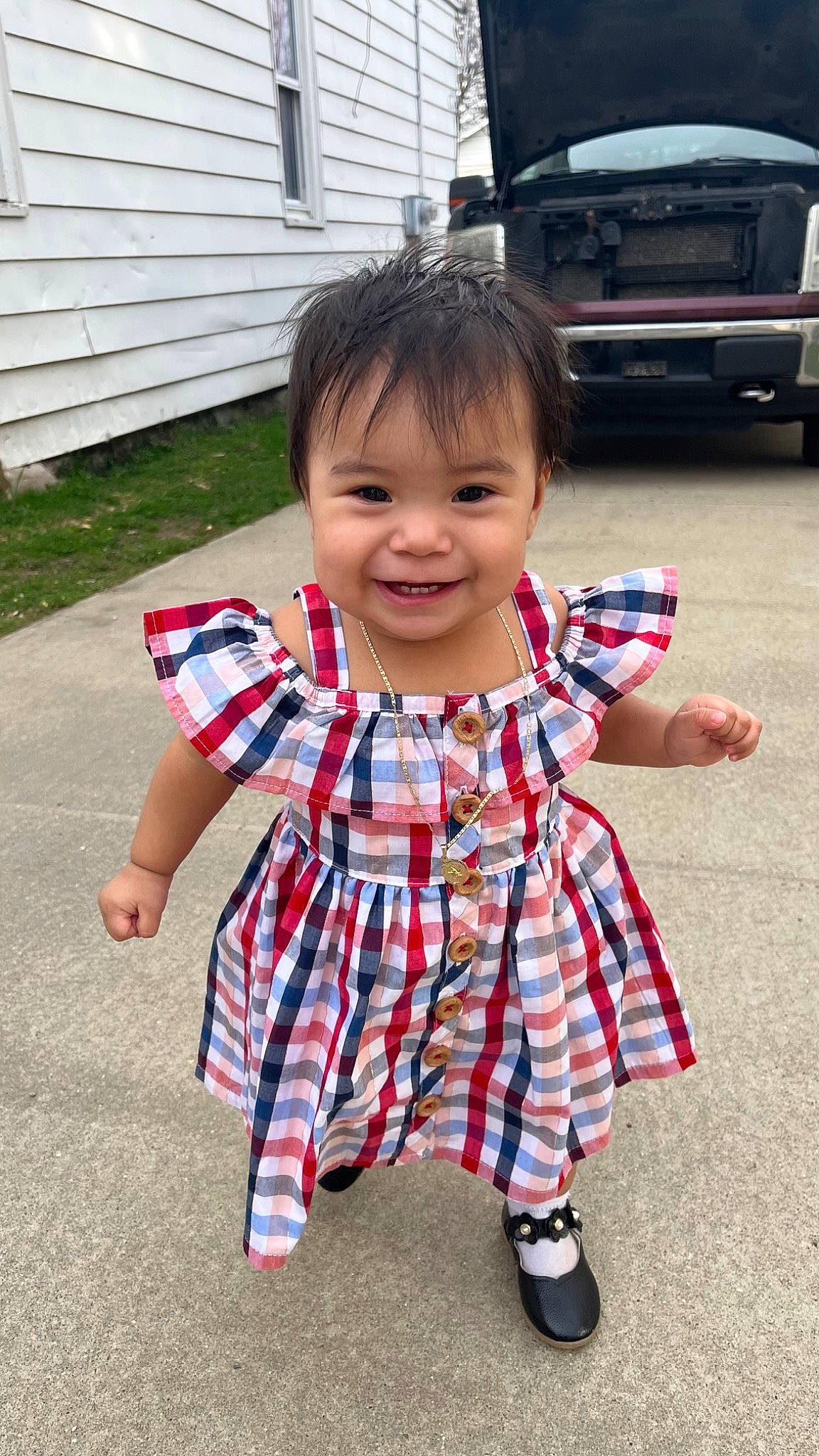 Analia joined the competition — help win amazing prizes! automotive_design, automotive_lighting, automotive_tail_brake_light, automotive_tire, baby, baby_toddler_clothing, car, child, fun, grass, happy, joy, motor_vehicle, person, personal_luxury_car, plaid, sleeve, smile, toddler, trunk
