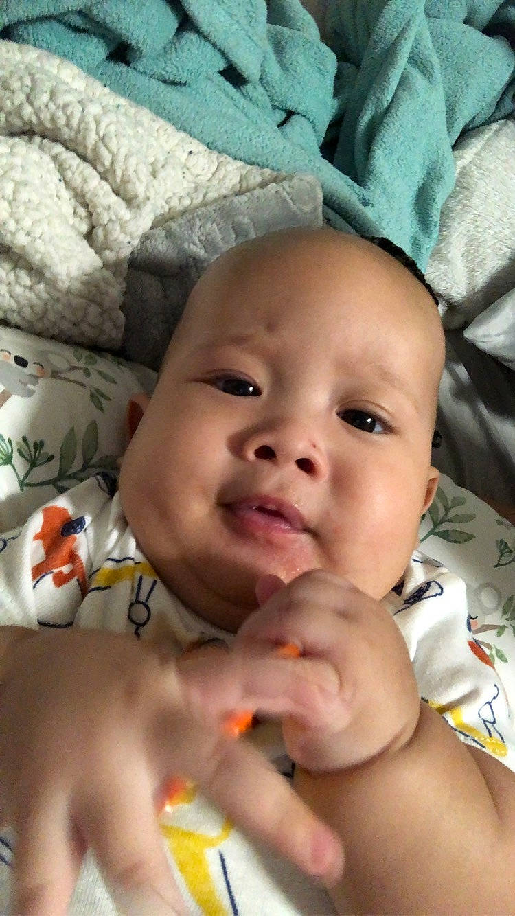 Kai joined the competition — help win amazing prizes! baby, cheek, chin, eye, eyebrow, eyelash, face, finger, gesture, happy, head, iris, lip, mouth, nose, person, skin, smile, textile, toddler