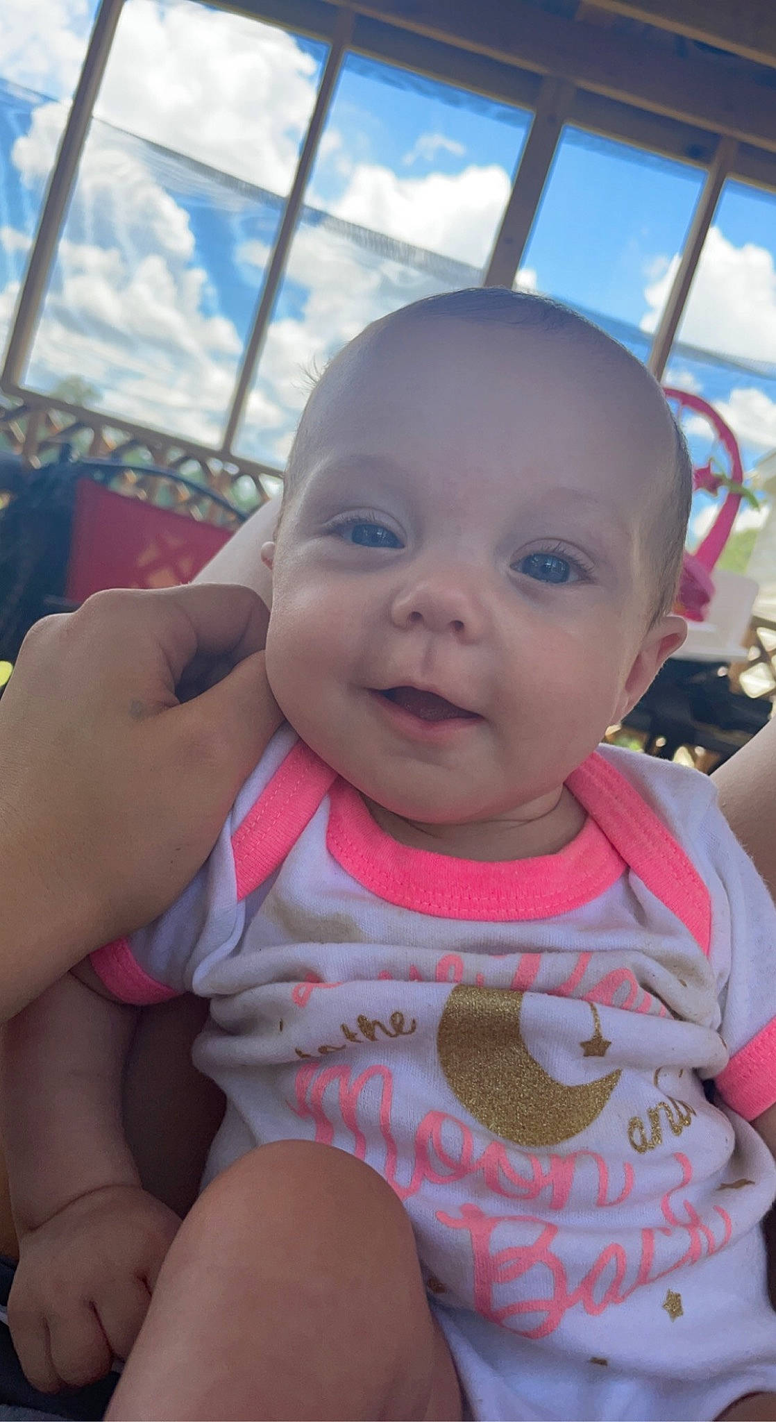 Arabella joined the competition — help win amazing prizes! baby, baby_toddler_clothing, blue, cheek, chin, cloud, face, facial_expression, finger, hairstyle, happy, human_body, lip, mouth, nose, person, pink, skin, sky, smile