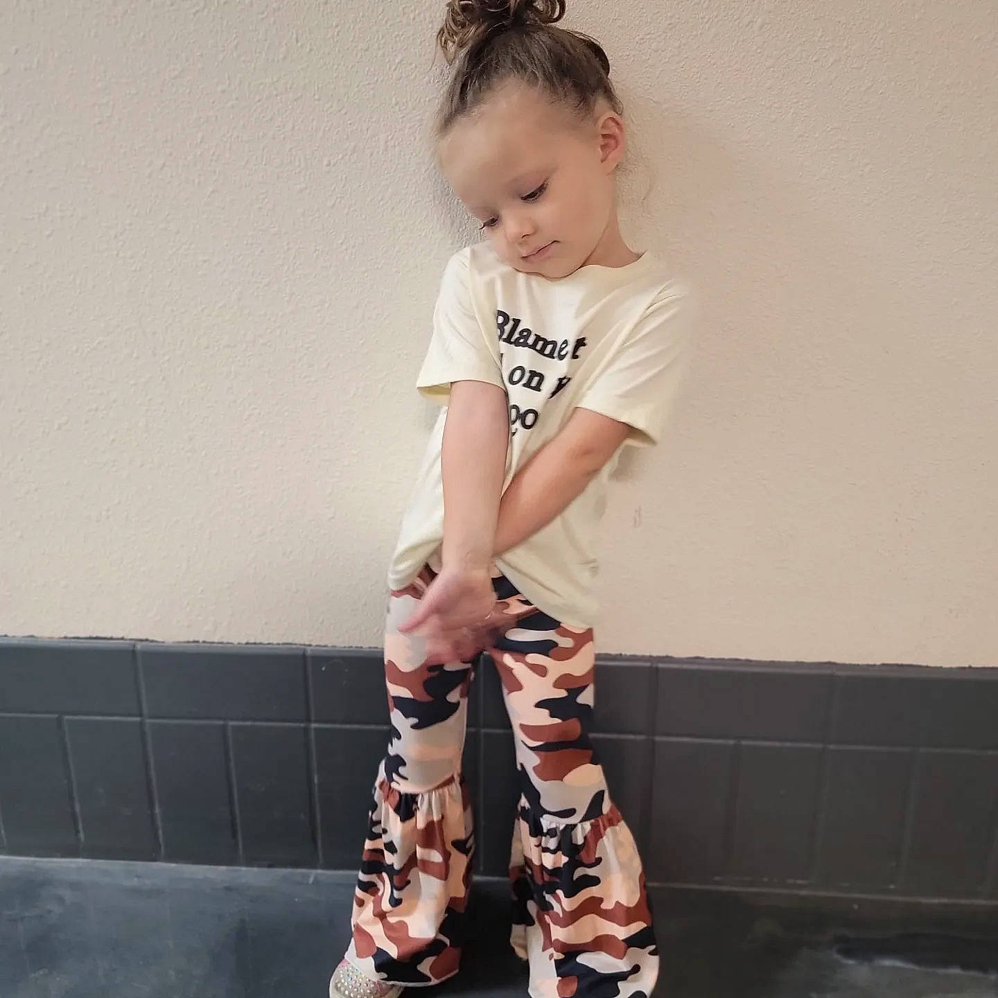 Maliyah joined the competition — help win amazing prizes! arm, baby_toddler_clothing, child, fashion_accessory, fashion_design, foot, human_leg, joint, knee, leg, neck, pattern, person, shoulder, sitting, sleeve, sportswear, t_shirt, thigh, toddler