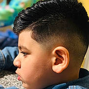 Mikael joined the competition — help win amazing prizes! child, boy, portrait, profile, face, haircut, hairstyle, short_hair, serious, indoors, sunlight, denim, shirt, ear, nose, eyes, head, person, close_up, photography