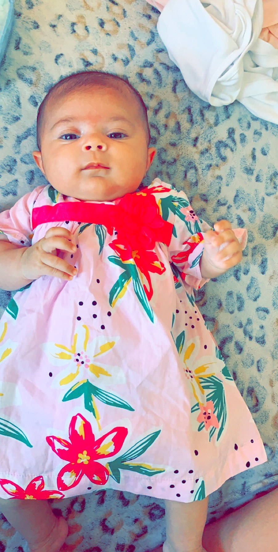 Rose participe au concours pour gagner de l'argent avec cette photo : baby, baby_products, baby_toddler_clothing, cheek, child, dress, nap_mat, pattern, person, pink, product, skin, sleeve, textile, toddler