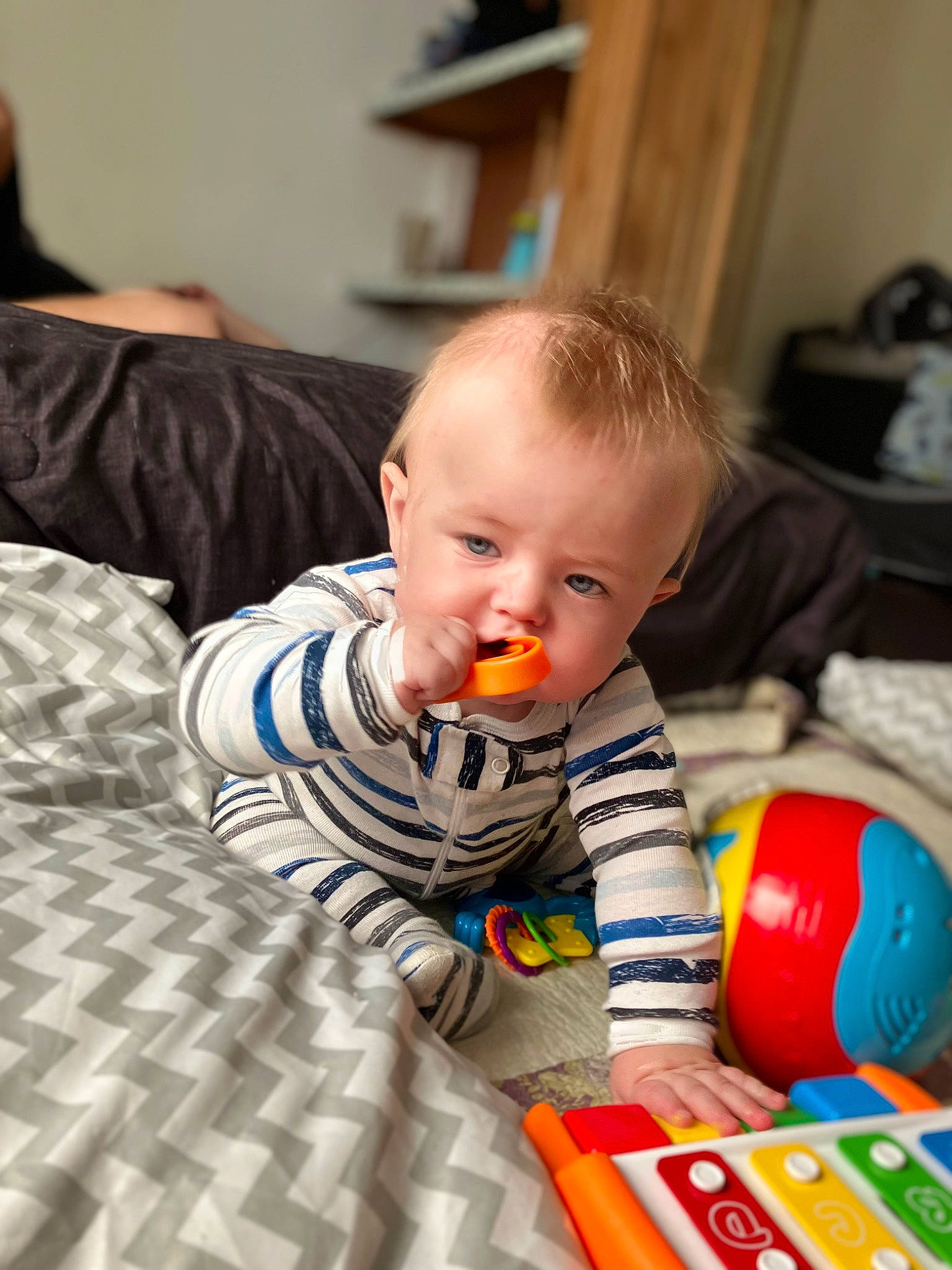 Brentley joined the competition — help win amazing prizes! baby, baby_playing_with_toys, baby_products, baby_toddler_clothing, baby_toys, cheek, child, comfort, flooring, fun, happy, hardwood, iris, person, play, room, sitting, toddler, toy, tummy_time