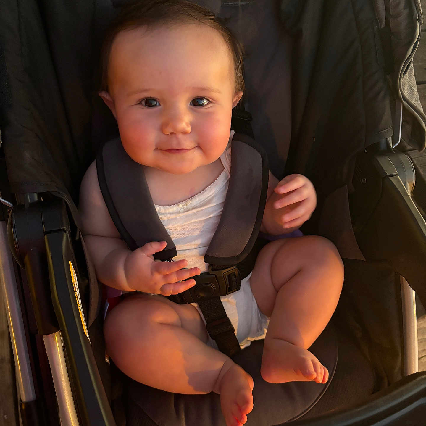 Ivy is registered to the contest to win money with this photo: accessories, baby, beverage, bodypart, car, car_interior, carseat, coffee, coffeecup, face, finger, hand, head, person, photography, portrait, strap, stroller, transportation, vehicle