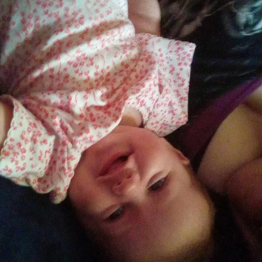 Maryjane is registered to the contest to win money with this photo: baby, bed, bedroom, clothing, couch, cushion, face, furniture, hat, head, homedecor, indoors, newborn, person, photography, portrait, quilt, room, selfie, sleeping