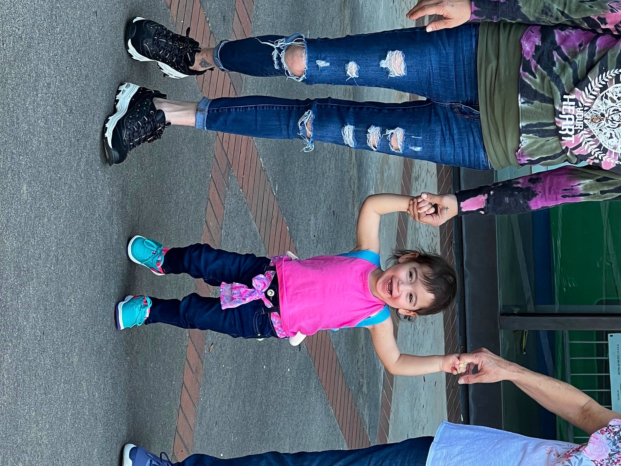 Kenna is registered to the contest to win money with this photo: black, blue, clothing, electric_blue, event, fun, green, joy, leg, leisure, magenta, people, person, photograph, pink, purple, snapshot, sneakers, thigh, toddler