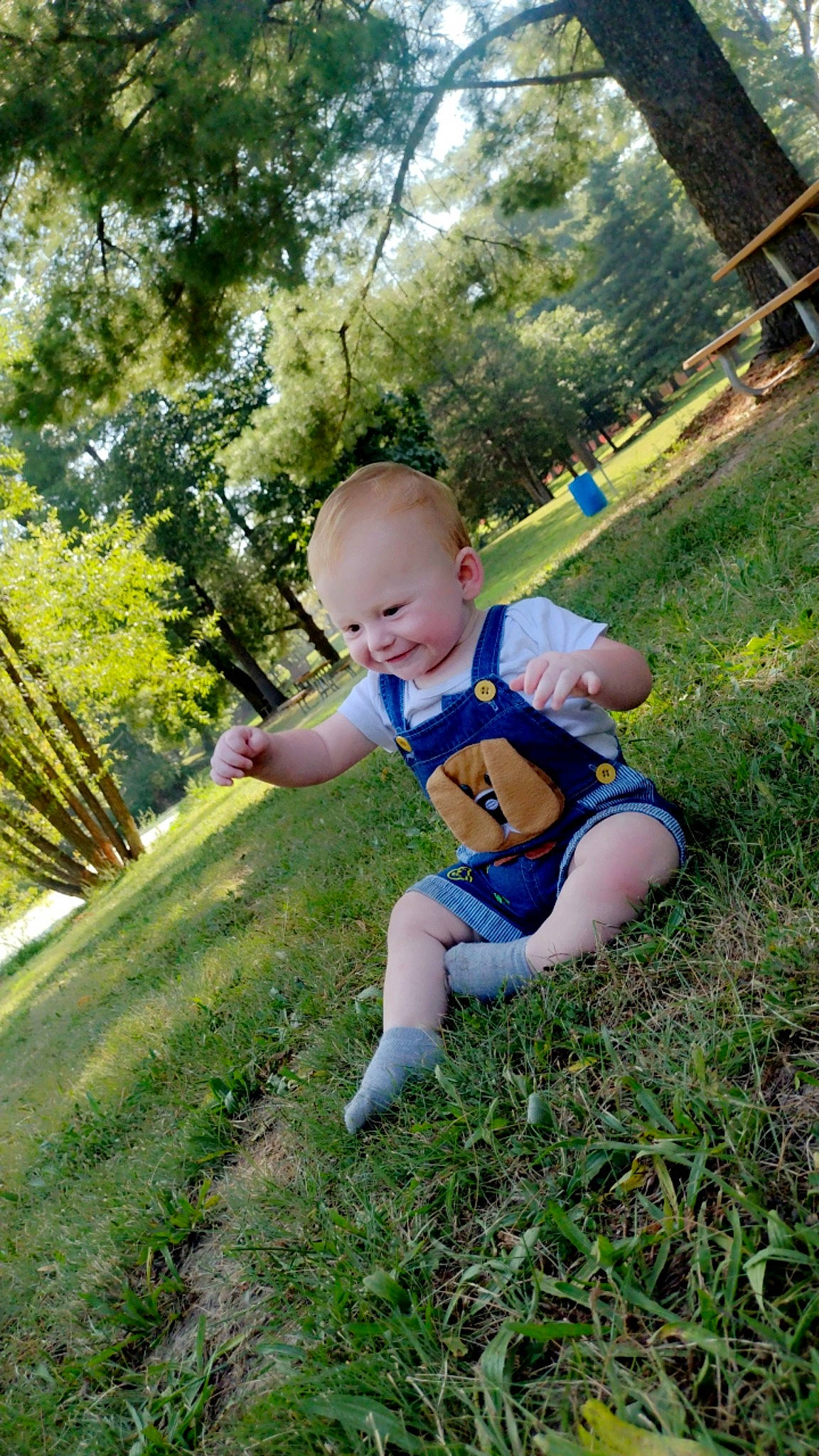 Chase joined the competition — help win amazing prizes! baby, baby_toddler_clothing, child, electric_blue, fun, grass, grassland, happy, joy, lawn, leisure, meadow, people_in_nature, person, plant, recreation, sitting, sky, sunlight, t_shirt
