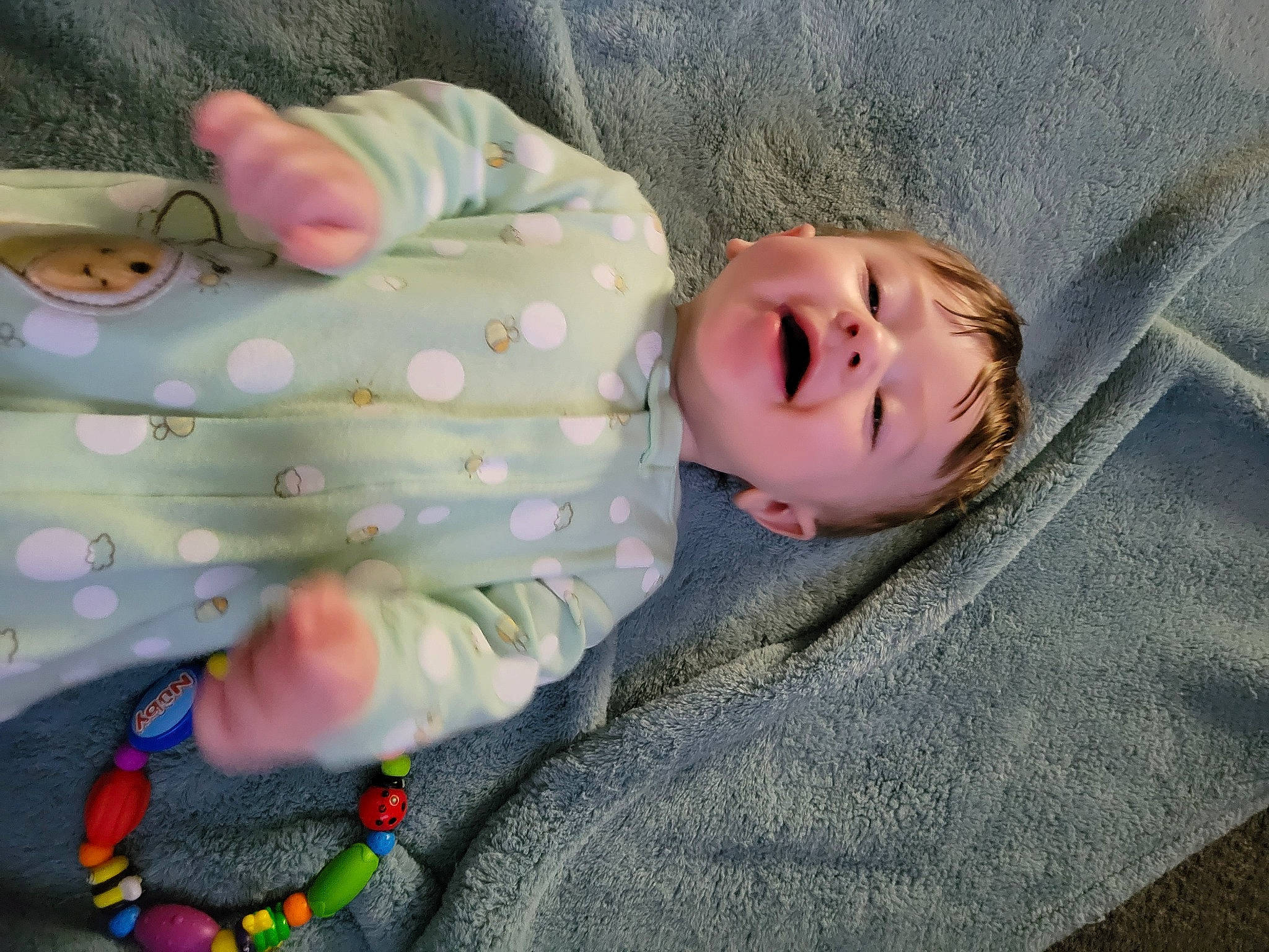 Jaxon is registered to the contest to win money with this photo: baby, baby_products, baby_sleeping, baby_toddler_clothing, bedding, bedtime, cheek, child, comfort, grass, linens, nap, pattern, person, room, sitting, sleep, sleeve, smile, toddler