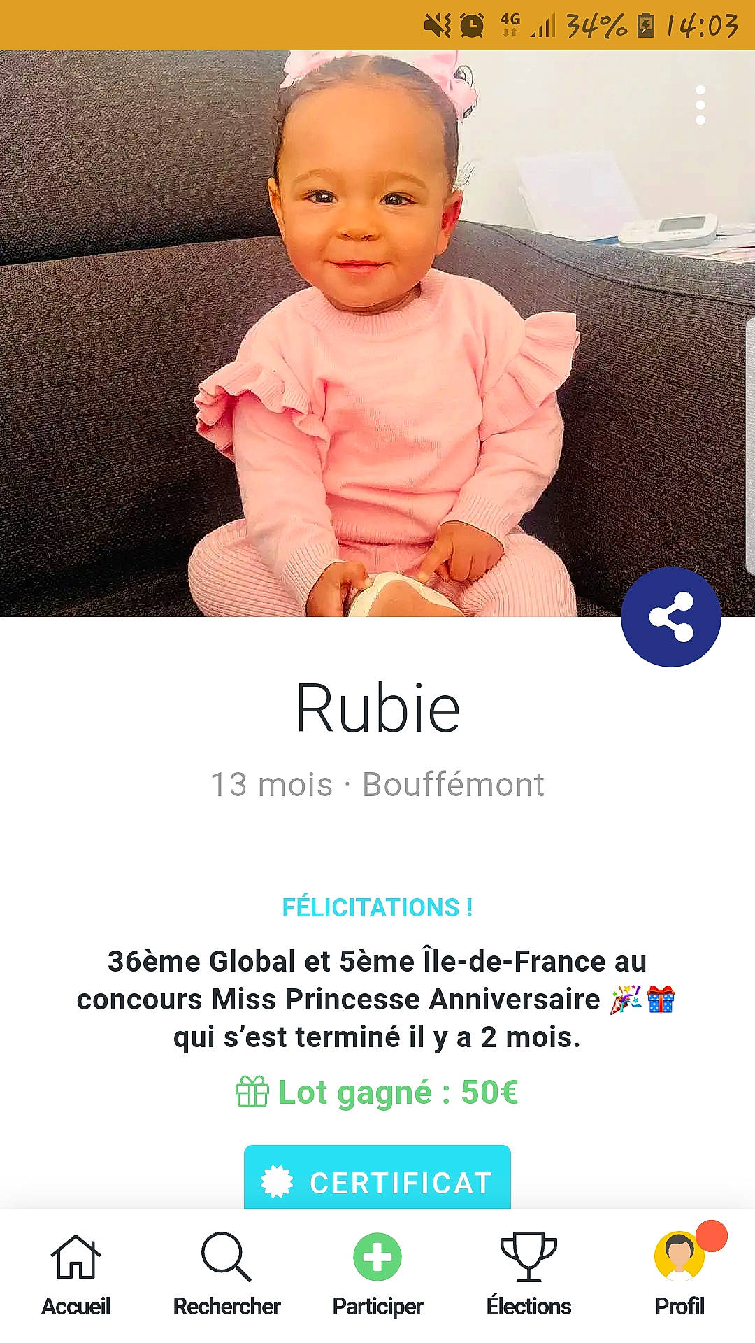 Emma participe au concours pour gagner de l'argent avec cette photo : advertising, baby, baby_toddler_clothing, child, comfort, font, gadget, gesture, happy, joy, logo, magenta, output_device, person, photo_caption, product, screenshot, sleeve, smile, thumb