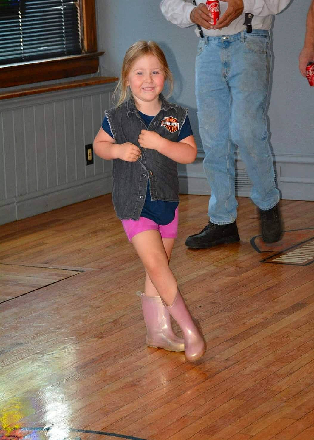 Skyler is registered to the contest to win money with this photo: barefoot, floor, flooring, foot, fun, gesture, hardwood, human_leg, joint, joy, knee, leg, person, shoe, shoulder, smile, sock, thigh, trunk, window