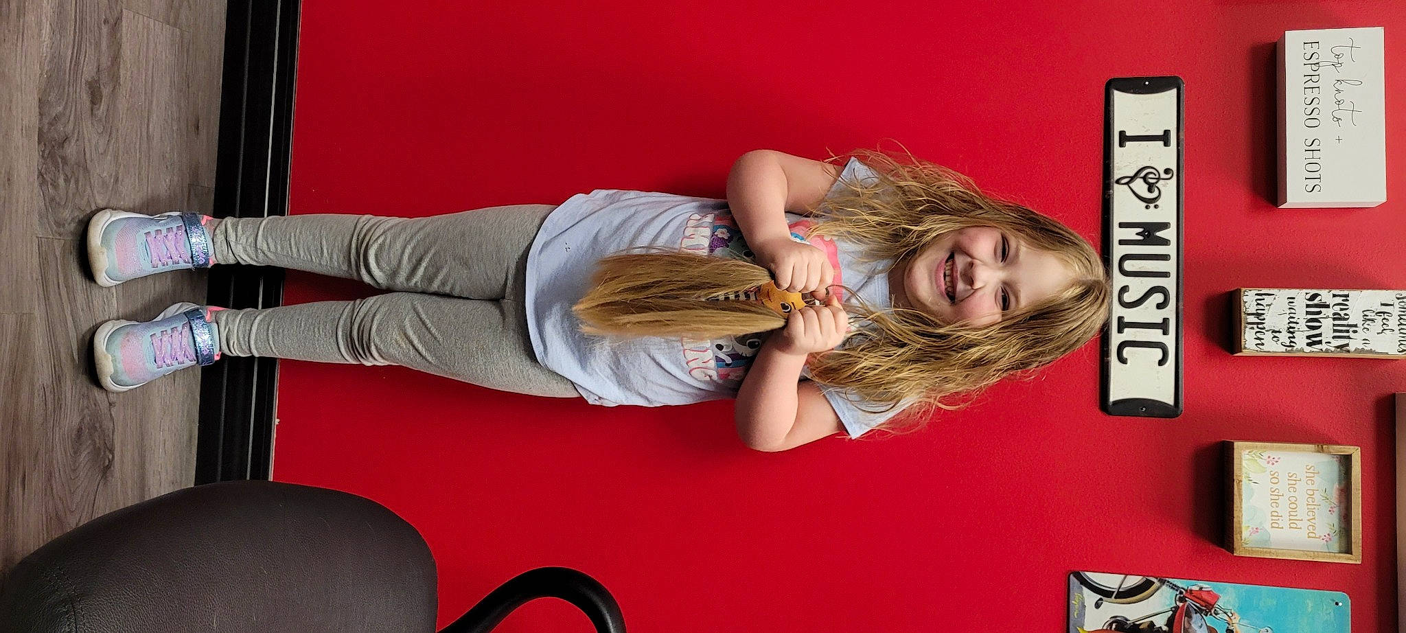 Skyler is registered to the contest to win money with this photo: advertising, blond, bracelet, comfort, elbow, eyewear, fun, happy, human_leg, joint, joy, knee, logo, person, room, sitting, smile, thigh, wrist