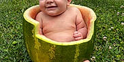 Elijah joined the competition — help win amazing prizes! baby, watermelon, grass, outdoor, smiling, fruit, cute, child, nature, summer, green, skin, happy, sitting, yard, house, foot, leg, head, cheerful