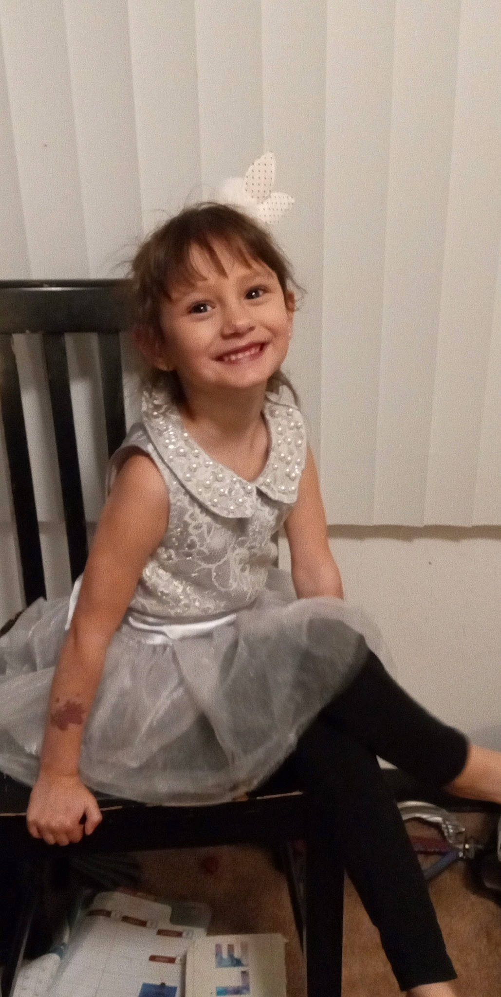 Aiyana joined the competition — help win amazing prizes! baby_toddler_clothing, child, day_dress, dress, embellishment, event, facial_expression, fashion_design, flash_photography, formal_wear, fun, happy, human_leg, joy, pattern, person, sitting, skin, sleeve, smile