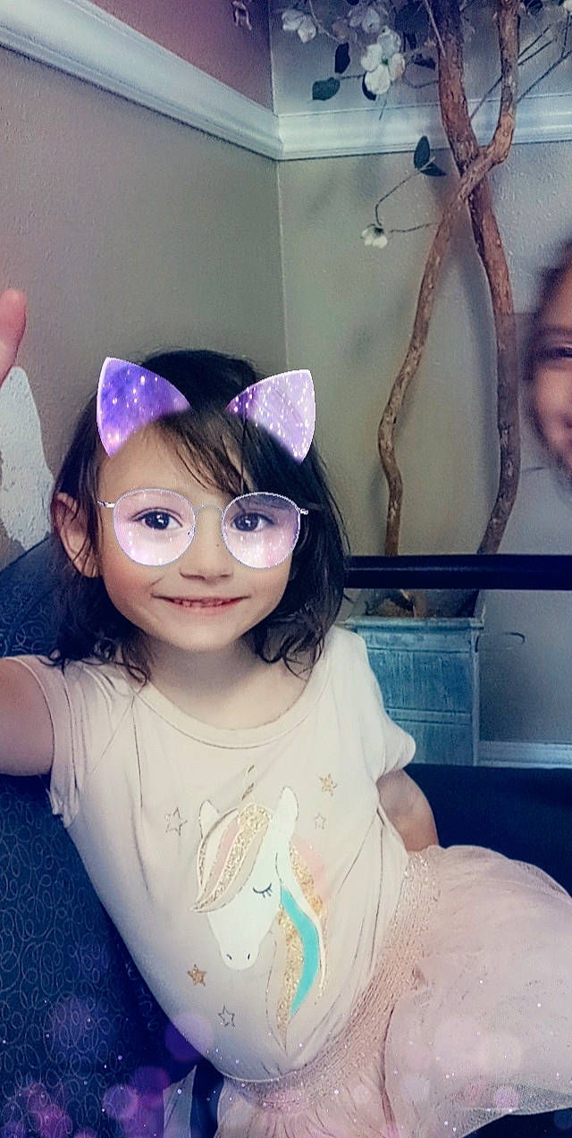 Aiyana joined the competition — help win amazing prizes! beauty, black_hair, costume_hat, ear, eyelash, eyewear, fashion_accessory, fun, hair_accessory, happy, headpiece, iris, joy, magenta, person, petal, pink, purple, smile, textile