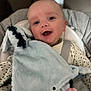 Luchi joined the competition — help win amazing prizes! baby, infant, smiling, happy, plush_toy, blue_blanket, cozy, child, cute, soft_toy, baby_seat, indoors, clothing, face, head, comfort, portrait, young_child, expression, cuddly