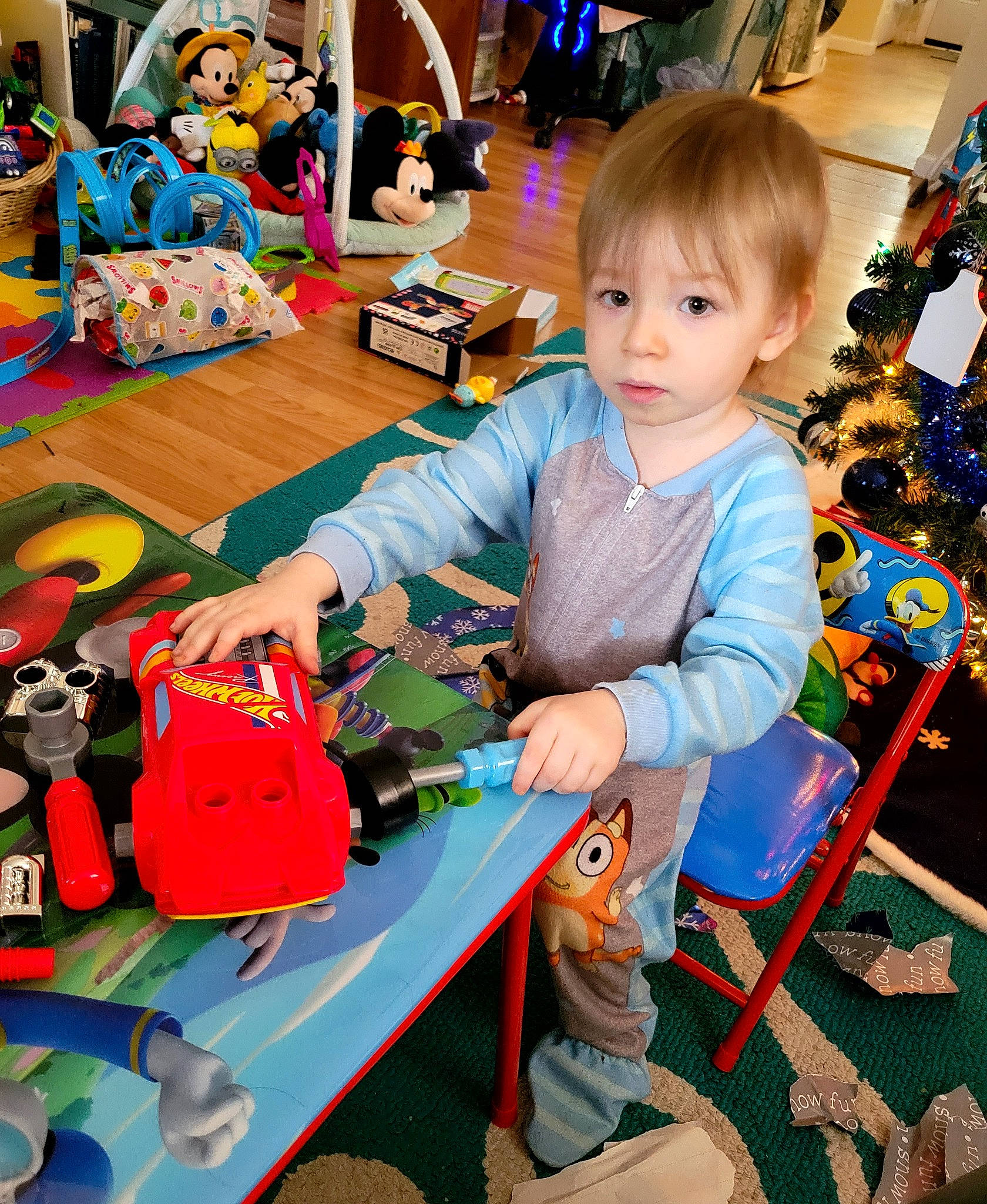 Damien joined the competition — help win amazing prizes! baby, baby_toddler_clothing, baby_toys, chair, child, event, fun, holiday, leisure, person, play, recreation, room, sharing, sitting, t_shirt, table, toddler, toy