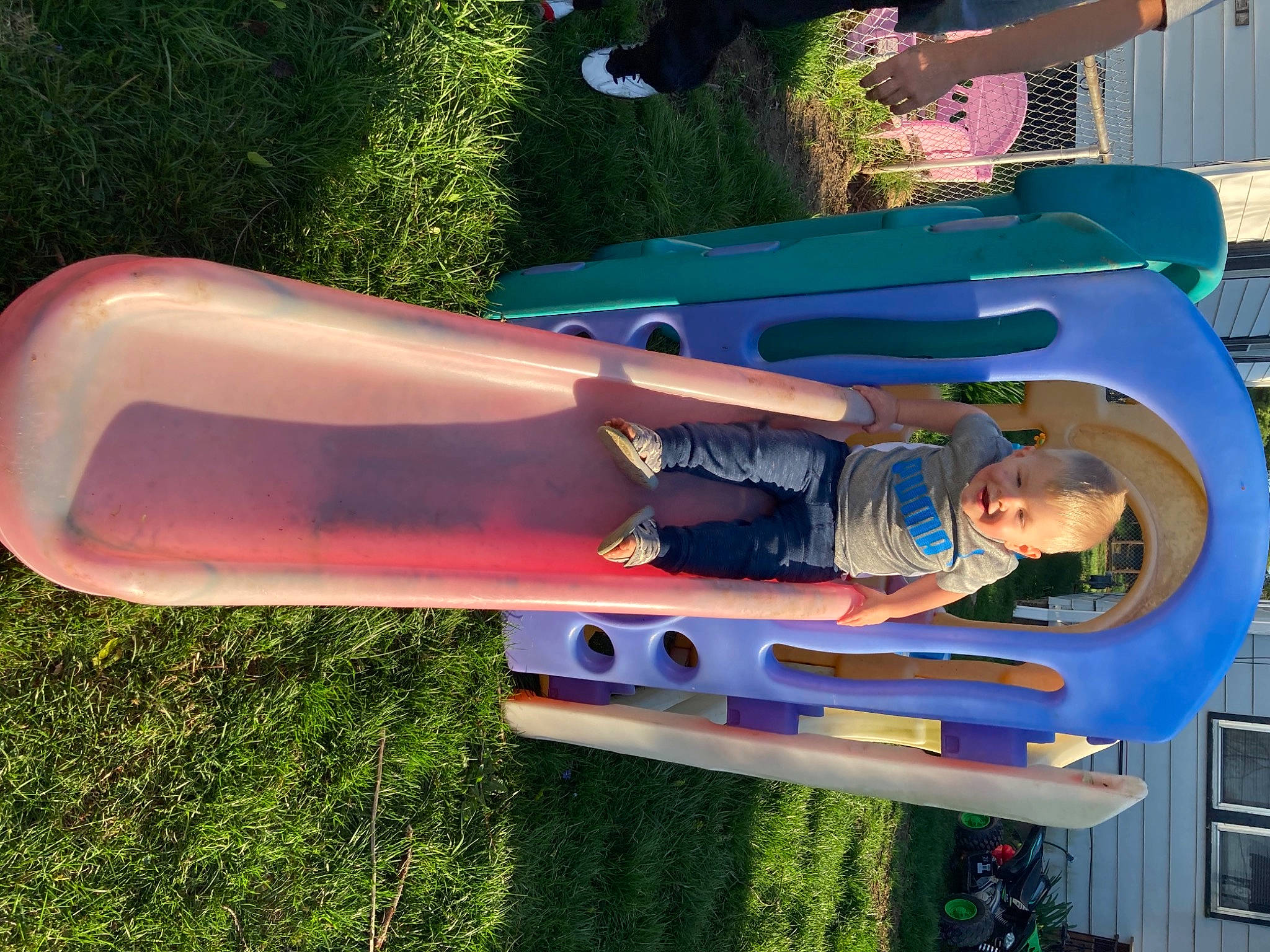 Camden joined the competition — help win amazing prizes! automotive_exhaust, bumper, child, chute, city, elbow, fun, games, grass, human_leg, leisure, outdoor_play_equipment, person, plant, plastic, play, playground, recreation, smile, toddler