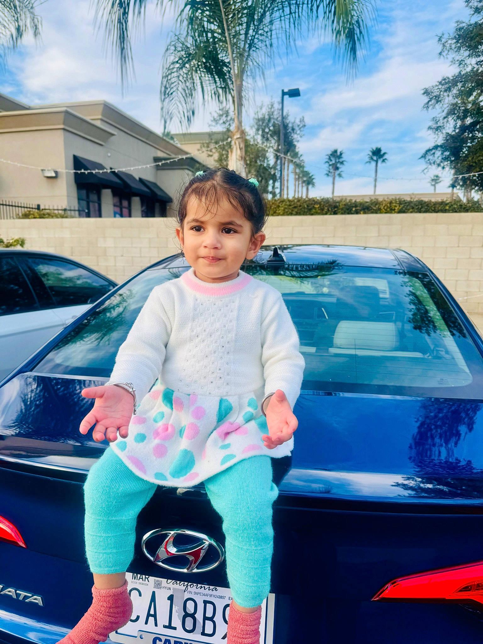 Asees Kaur is registered to the contest to win money with this photo: auto_part, automotive_design, automotive_exterior, automotive_lighting, azure, bumper, car, cloud, electric_blue, hood, joy, land_vehicle, motor_vehicle, parking, person, sky, tints_and_shades, toddler, tree, trunk