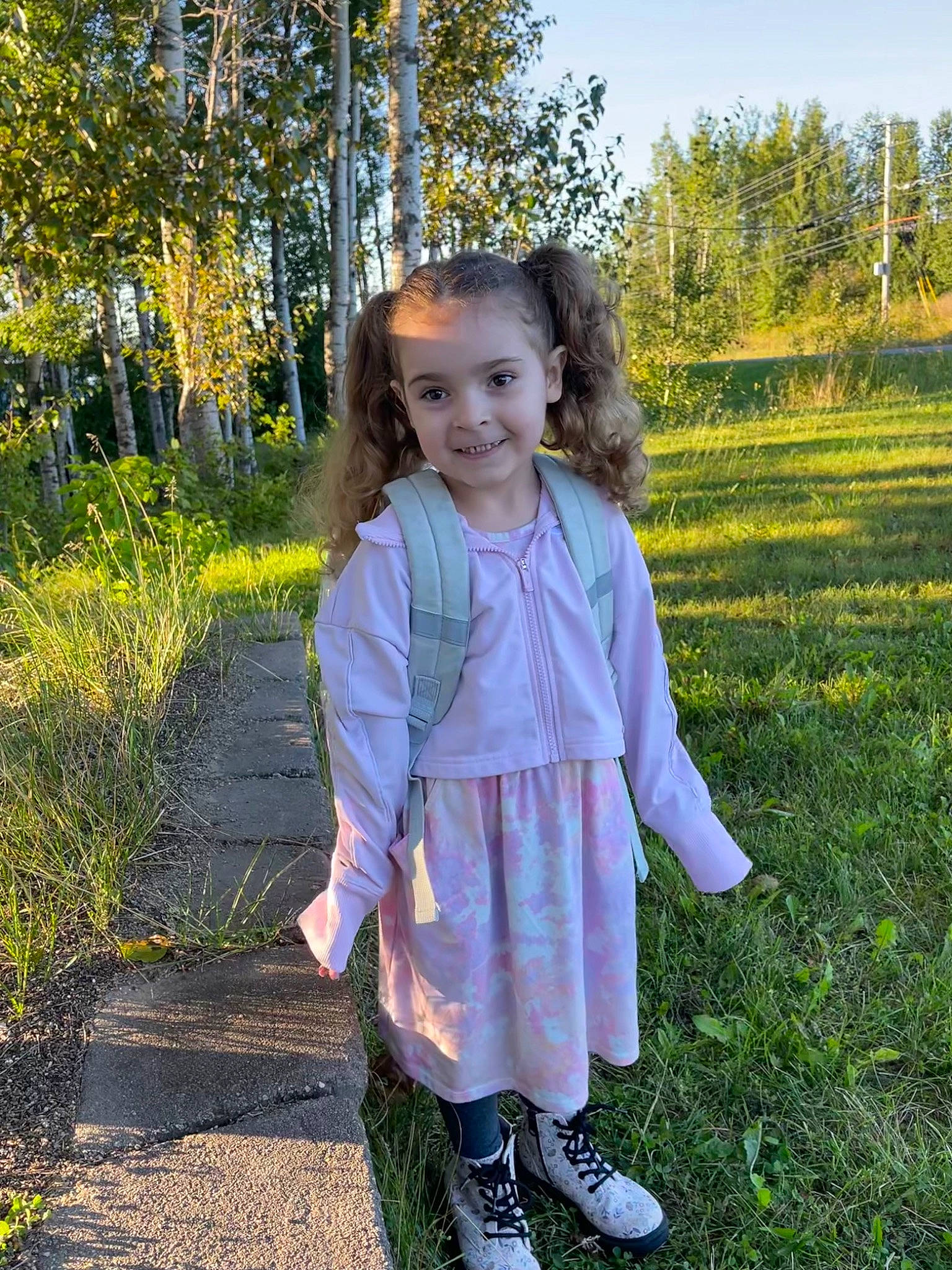 Mackiah joined the competition — help win amazing prizes! baby_toddler_clothing, blond, boot, child, electric_blue, eye, fun, grass, grassland, happy, head, joy, pattern, people_in_nature, person, plant, sandal, sky, sleeve, smile