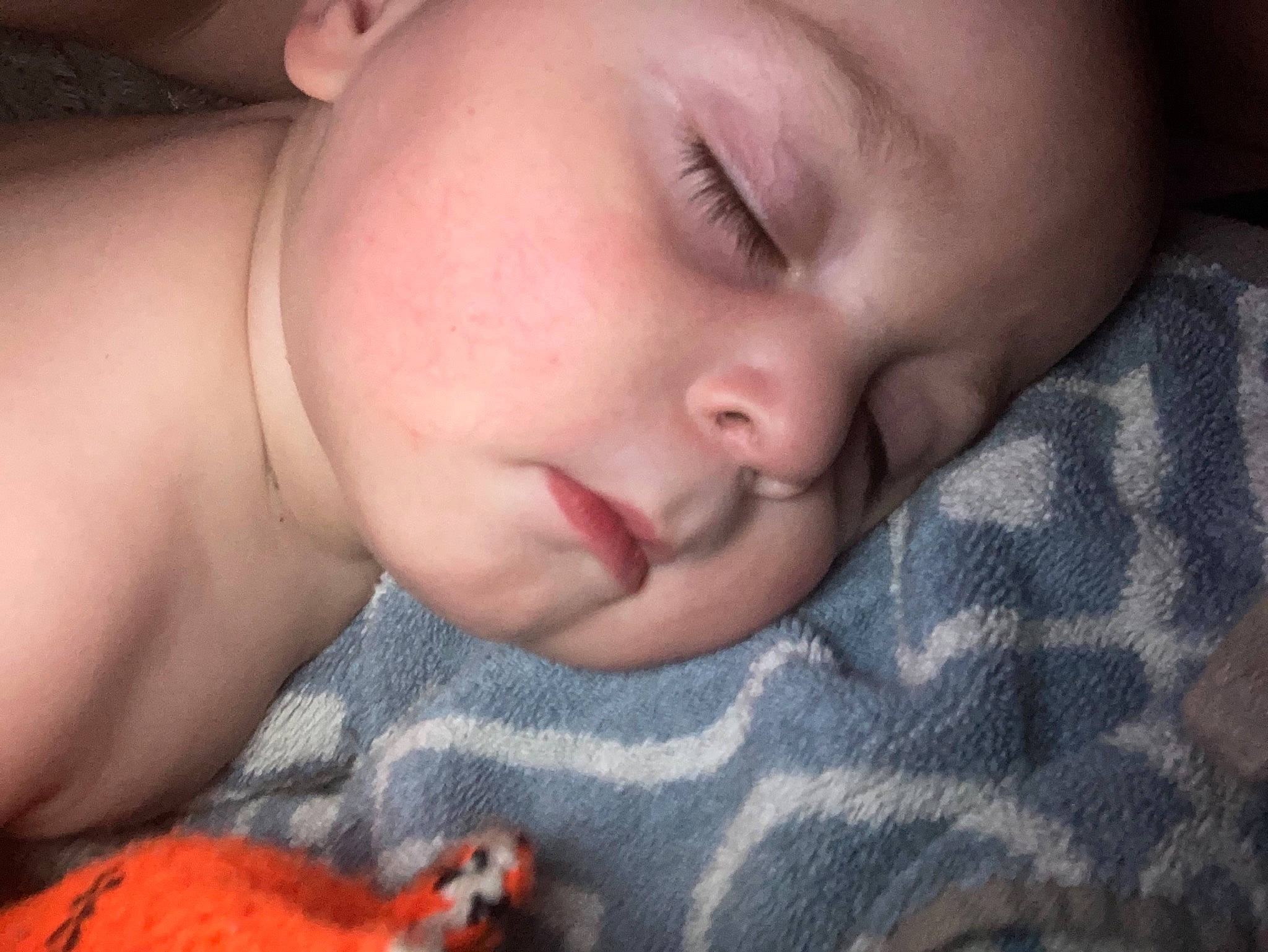 Malachi is registered to the contest to win money with this photo: baby, baby_sleeping, bed, bedtime, carmine, cheek, child, close_up, comfort, eyelash, finger, gesture, linens, mouth, nose, pattern, person, skin, textile, thumb