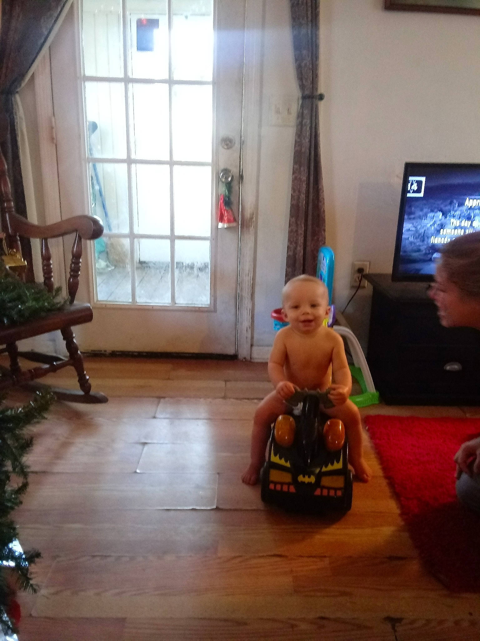 Troy is registered to the contest to win money with this photo: chair, floor, flooring, furniture, hardwood, leisure, person, room, sitting, wood