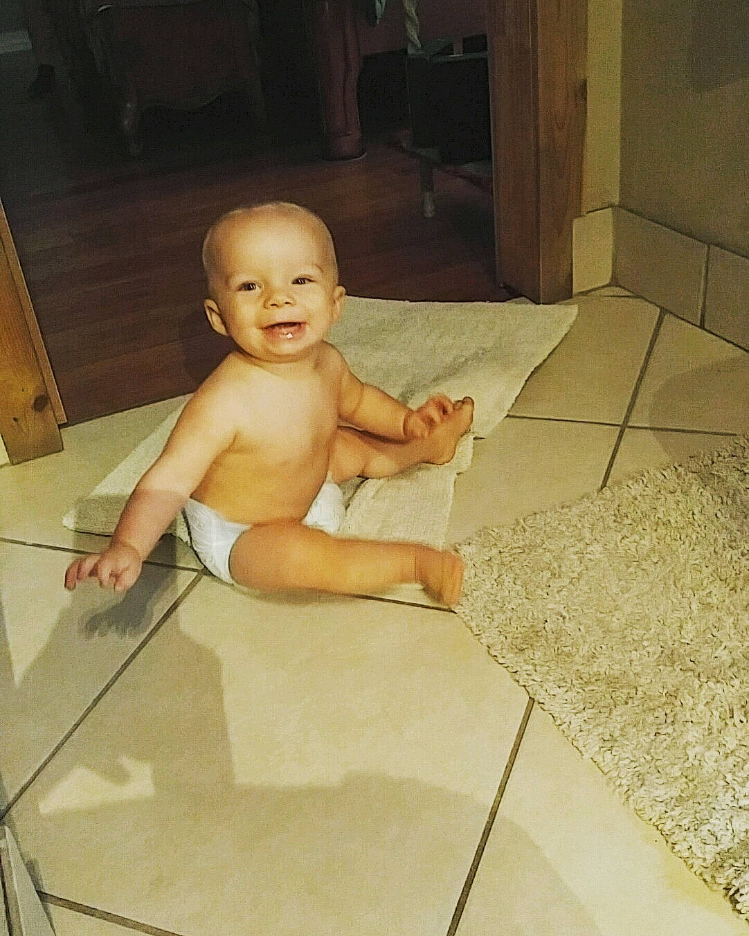 Troy joined the competition — help win amazing prizes! baby, child, face, floor, flooring, head, leg, person, photography, skin, tile, toddler