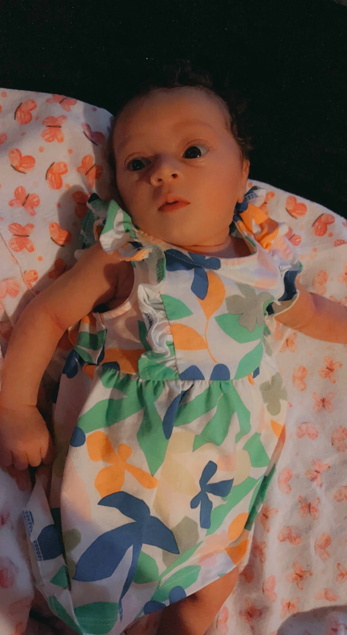 Lily-rose is registered to the contest to win money with this photo: baby, baby_toddler_clothing, cheek, child, collar, comfort, finger, hand, head, linens, neck, orange, pattern, person, product, skin, sleeve, t_shirt, textile, thumb