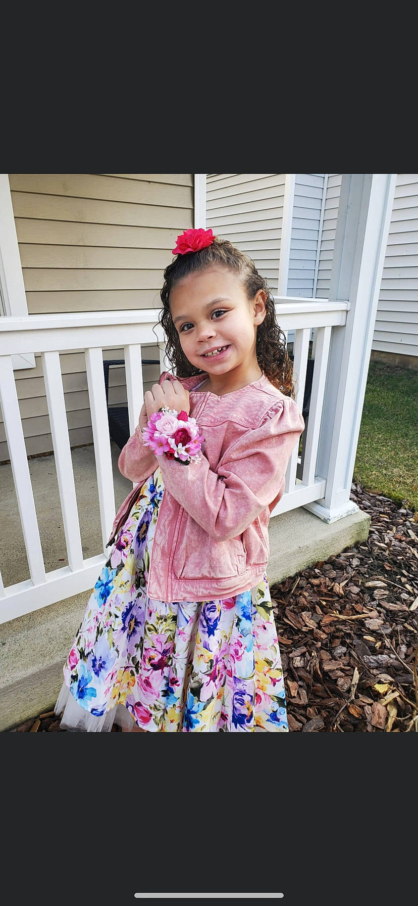 Jasmine is registered to the contest to win money with this photo: baby_toddler_clothing, child, clothing, day_dress, dress, face, formal_wear, happy, joy, magenta, outerwear, pattern, people_in_nature, person, pink, plant, purple, sleeve, smile, street_fashion