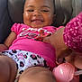 Chylyn is registered to the contest to win money with this photo: baby, car_seat, child, closeup, clothing, cute, hand, happy, indoors, infant, joyful, pacifier, patterned_shorts, person, pink_shirt, portrait, seat, sippy_cup, smiling, toddler