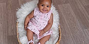 Chylyn joined the competition — help win amazing prizes! baby, basket, child, comfortable, cozy, cute, floor, fluffy_blanket, footwear, happy, indoors, infant, person, pink_dress, portrait, sandals, sitting, skin, small_child, smile