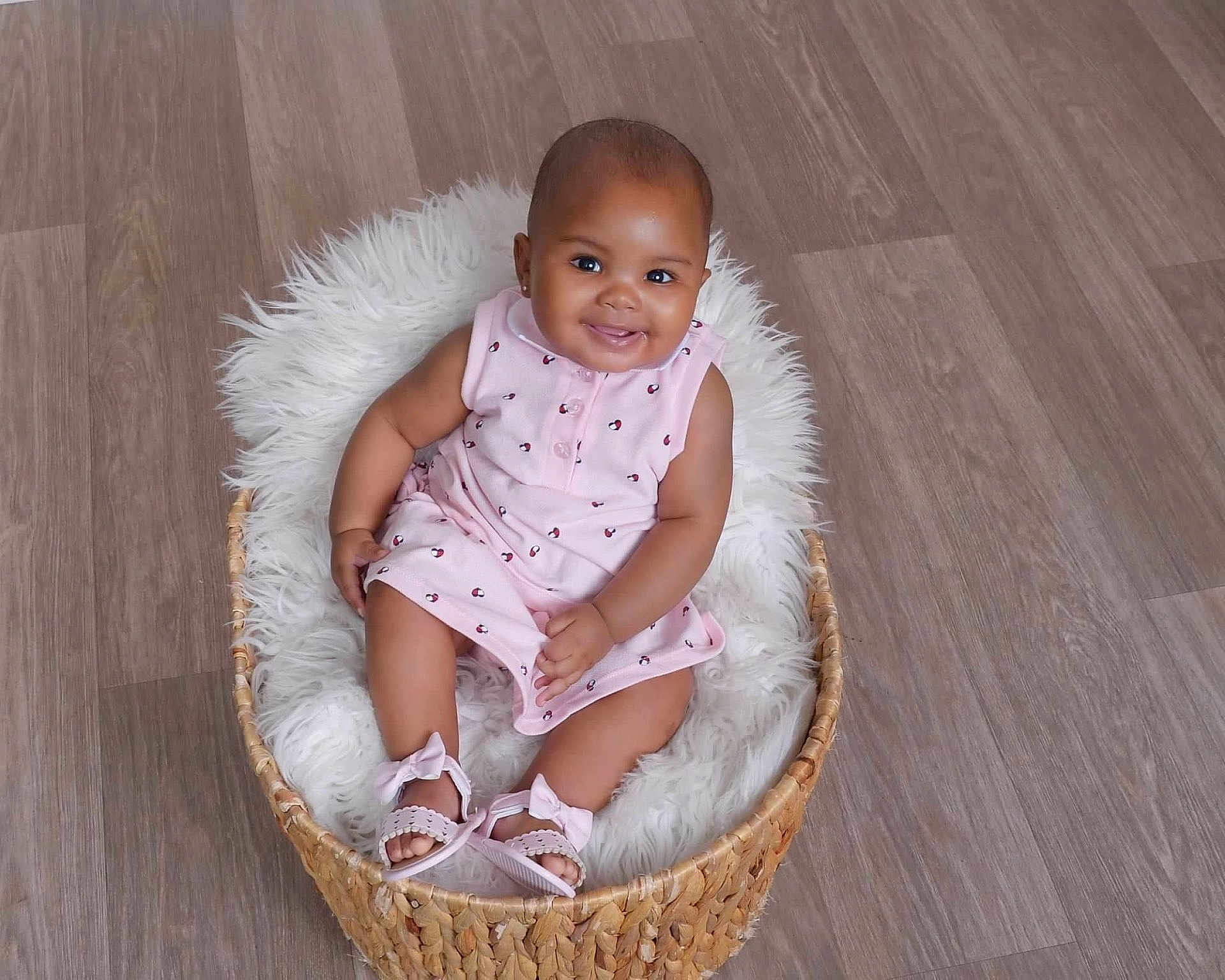 Chylyn joined the competition — help win amazing prizes! baby, basket, child, comfortable, cozy, cute, floor, fluffy_blanket, footwear, happy, indoors, infant, person, pink_dress, portrait, sandals, sitting, skin, small_child, smile