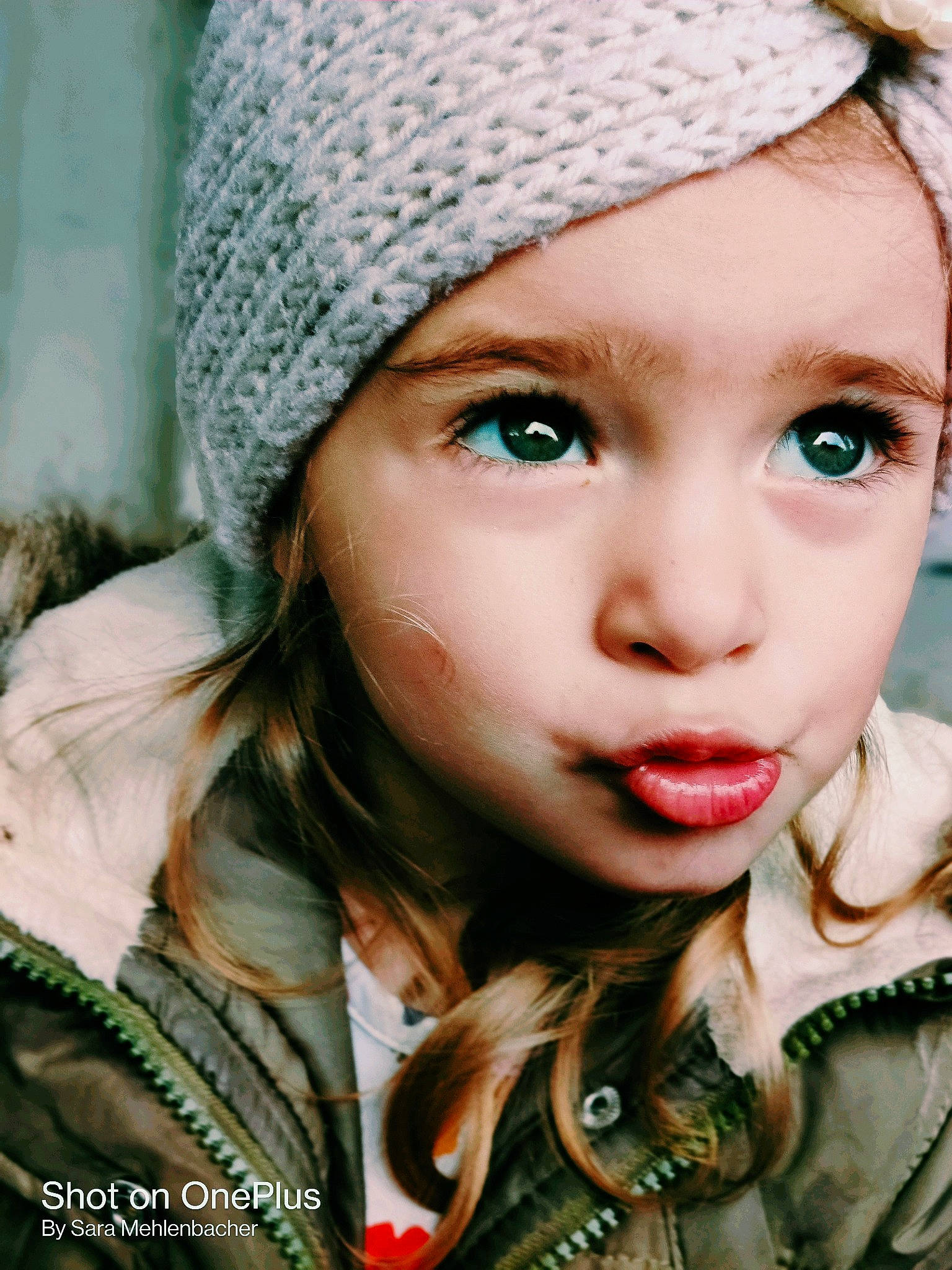 Paige is registered to the contest to win money with this photo: beauty, cap, cheek, chin, clothing, cool, eye, eyebrow, eyelash, happy, headgear, headwear, knit_cap, lip, long_hair, military_camouflage, nose, organ, outerwear, person