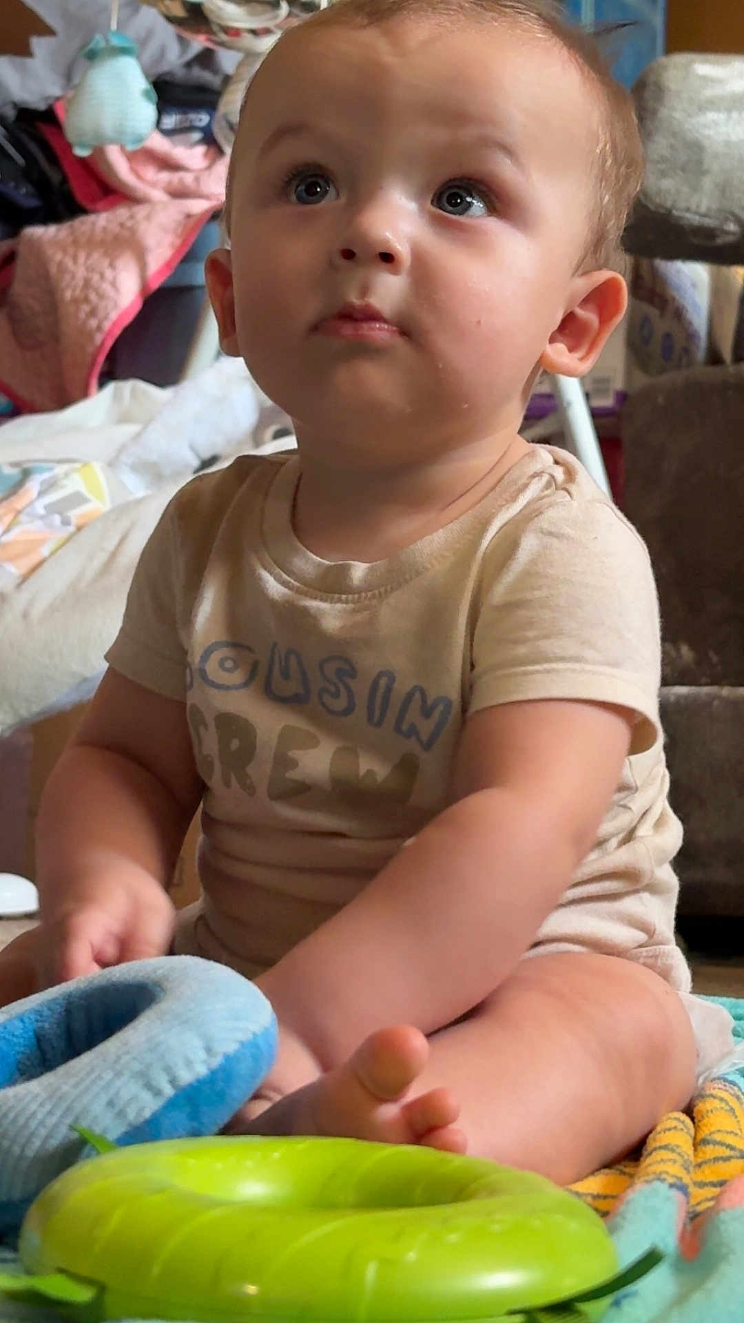 Nash joined the competition — help win amazing prizes! baby, blanket, child, closeup, clothing, colorful, curious, cute, expression, face, foot, home, indoor, infant, person, playtime, sitting, soft_toy, toy, young