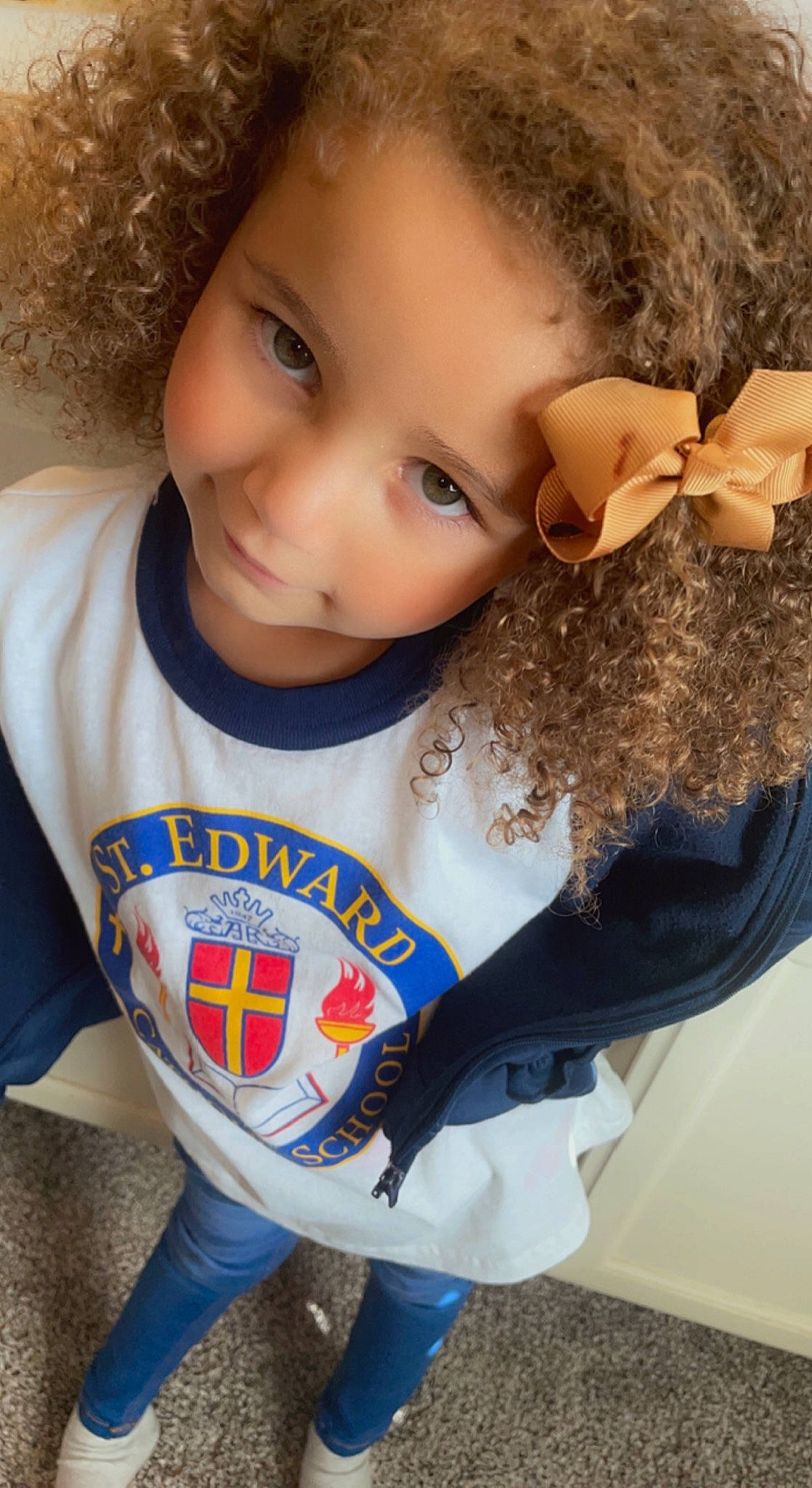 Ruby is registered to the contest to win money with this photo: baby_toddler_clothing, brown_hair, child, cool, electric_blue, eye, eyelash, fun, hair, happy, head, joy, lip, neck, organ, outerwear, person, skin, sleeve, t_shirt