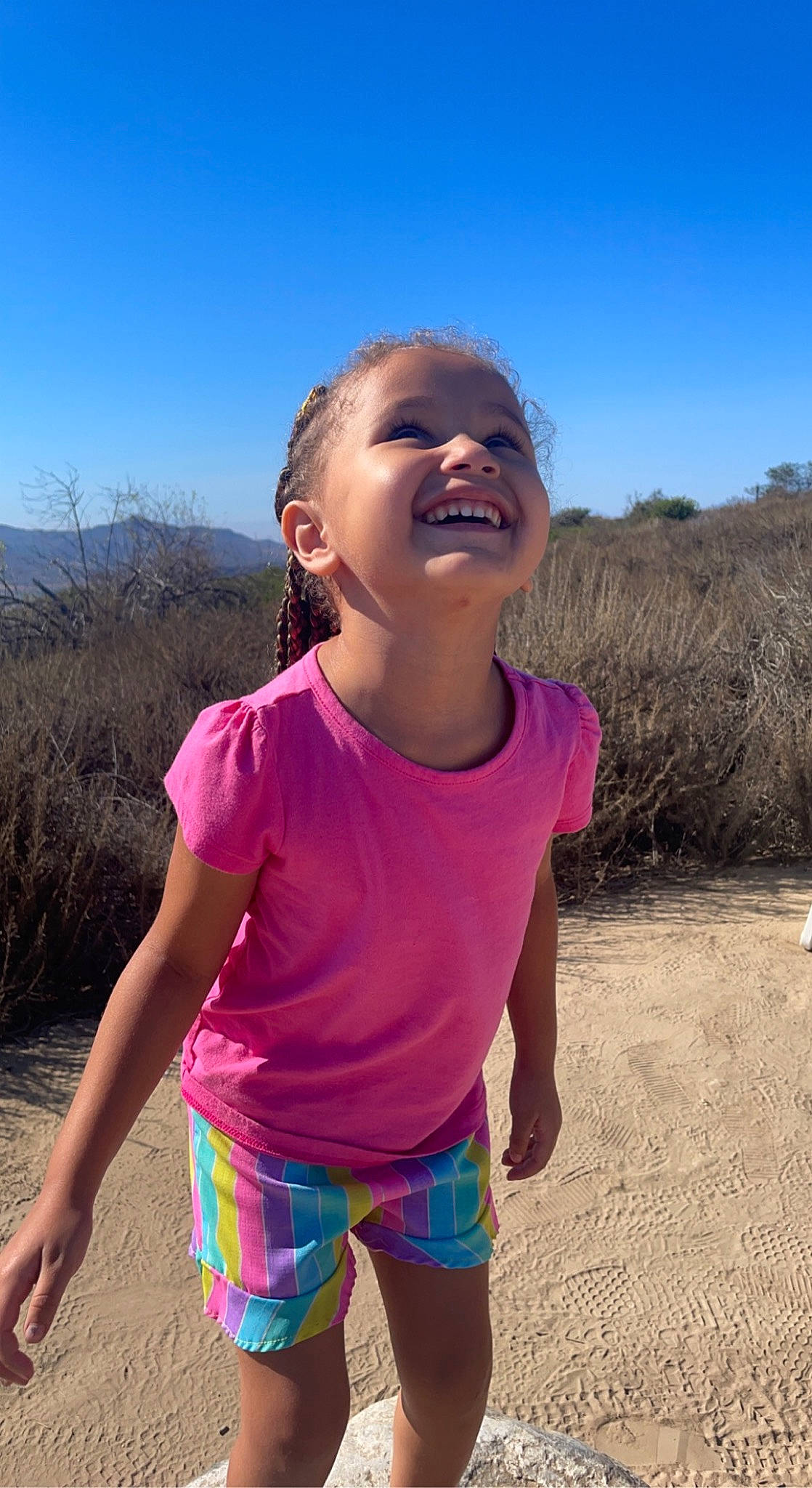 Ruby joined the competition — help win amazing prizes! cool, electric_blue, fun, grass, grassland, happy, landscape, leisure, mouth, people_in_nature, person, recreation, shorts, sky, sleeve, smile, sunlight, t_shirt, toddler, travel