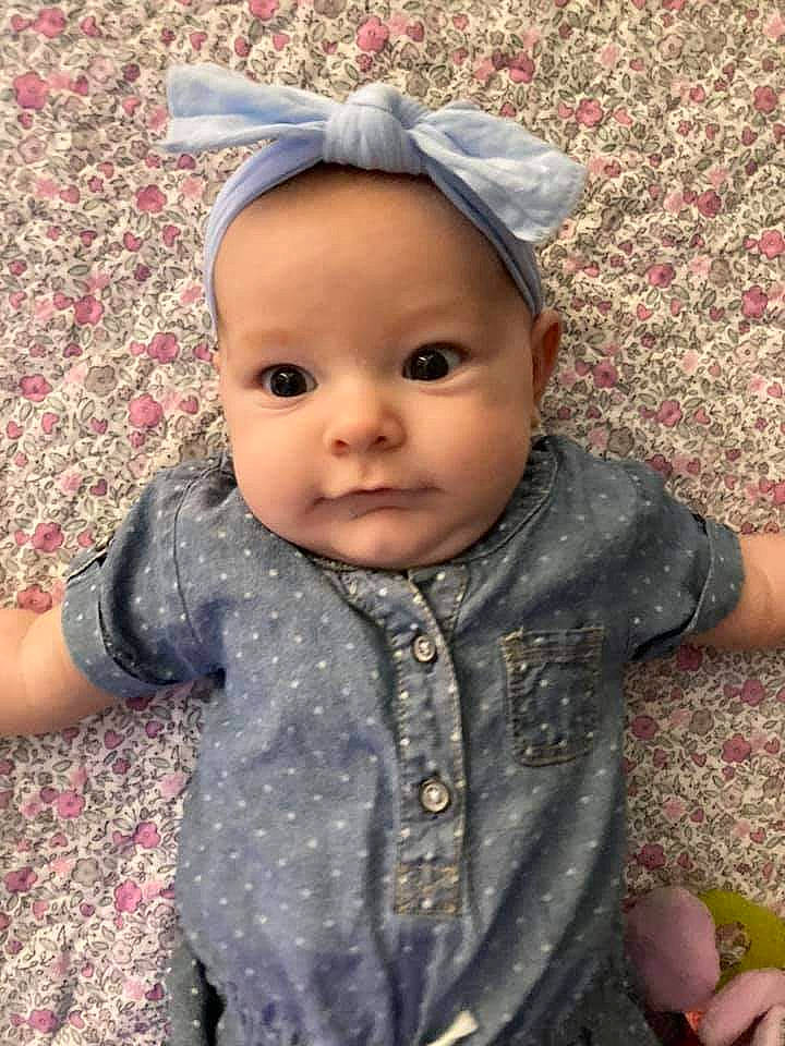 Elena joined the competition — help win amazing prizes! baby, baby_toddler_clothing, beanie, cap, cheek, child, eye, fashion_accessory, grass, knit_cap, lip, nose, pattern, person, sitting, skin, sleeve, toddler, winter, wool