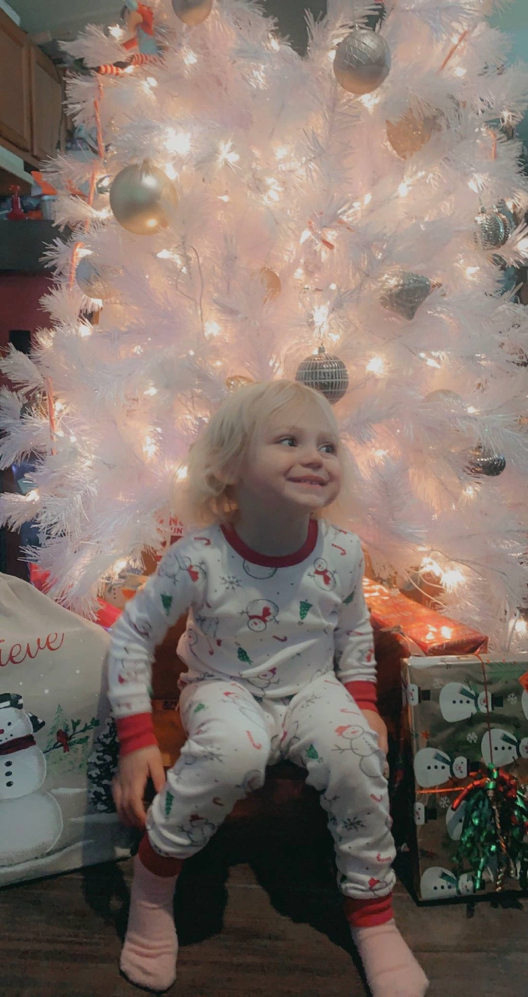 Huntleigh joined the competition — help win amazing prizes! baby, baby_toddler_clothing, child, christmas, christmas_eve, christmas_ornament, design, event, fun, happy, holiday, human_body, joy, ornament, pattern, person, pink, sitting, smile, toddler