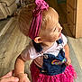 toddler, child, indoor, holding_hand, pink_headband, denim_overalls, colorful_clothing, curious, wooden_floor, person, infant, cute, baby, hand, casual, young_child, portrait, small, cute_outfit, innocence