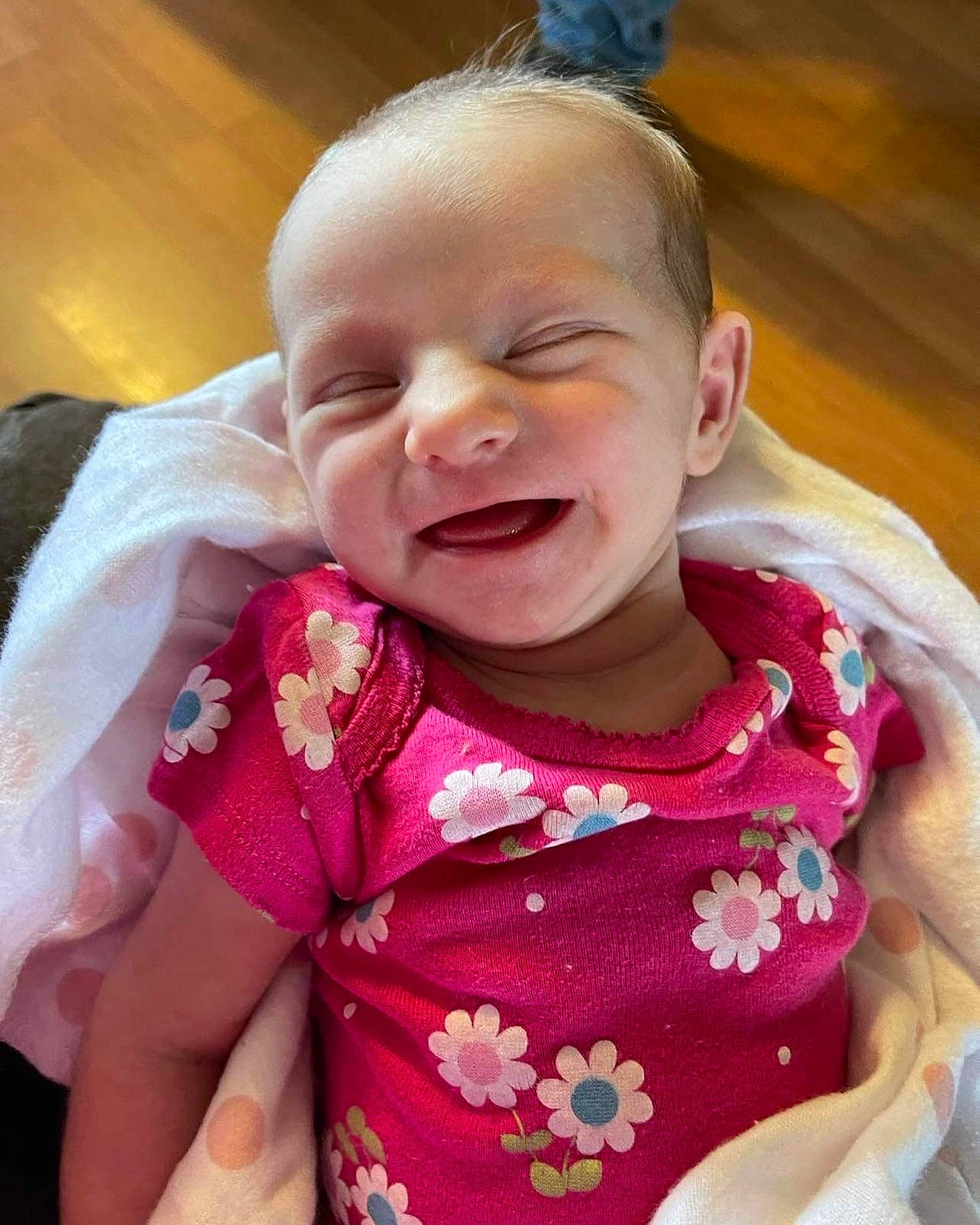 Mariah is registered to the contest to win money with this photo: baby, baby_toddler_clothing, cheek, dress, eyebrow, finger, gesture, happy, human_body, iris, lip, mouth, neck, nose, person, pink, skin, sleeve, smile, toddler