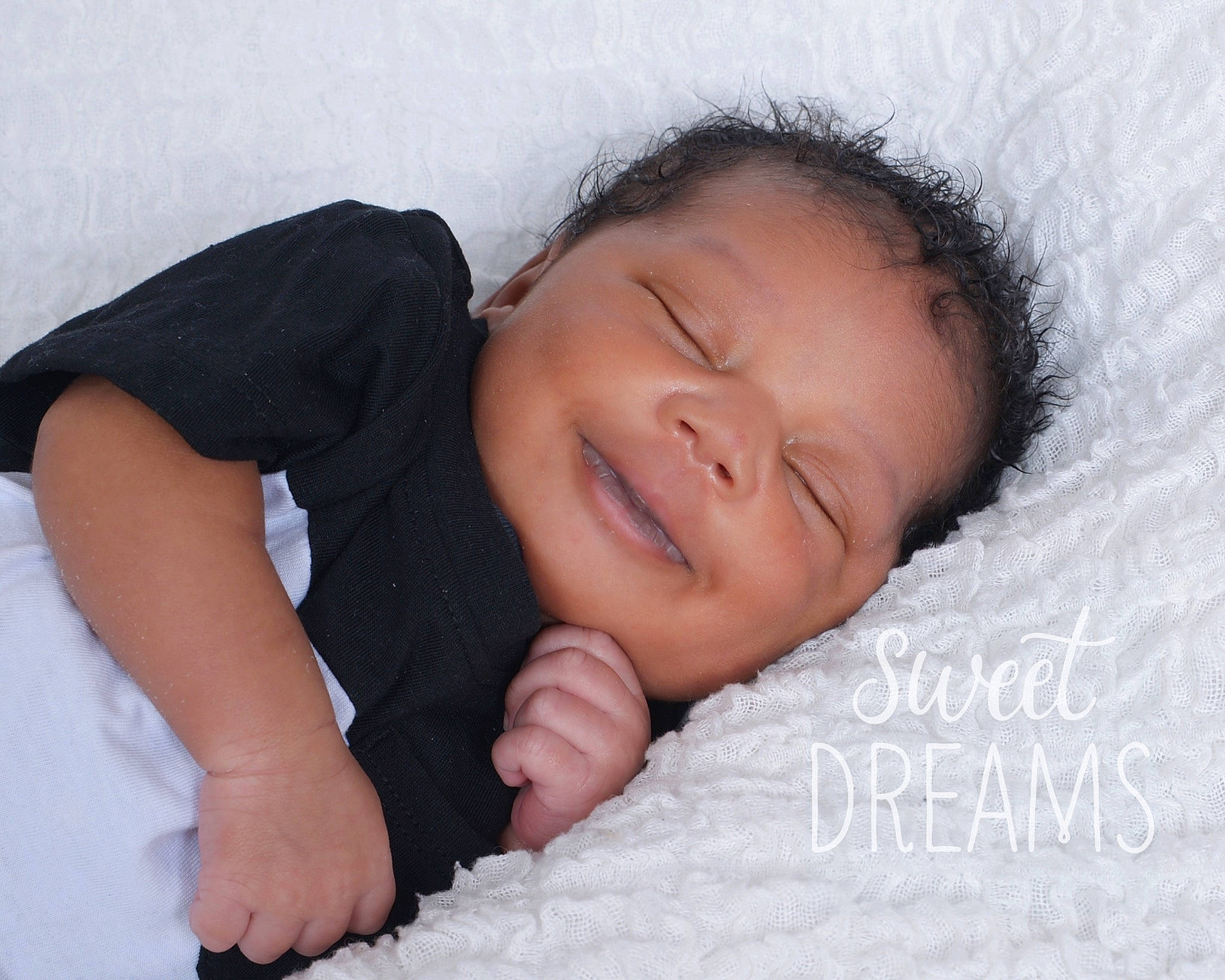 Denzel is registered to the contest to win money with this photo: baby, baby_sleeping, baby_toddler_clothing, bedding, bedtime, cheek, child, comfort, flash_photography, fur, gesture, happy, linens, mammal, nap, nose, person, skin, sleeve, smile