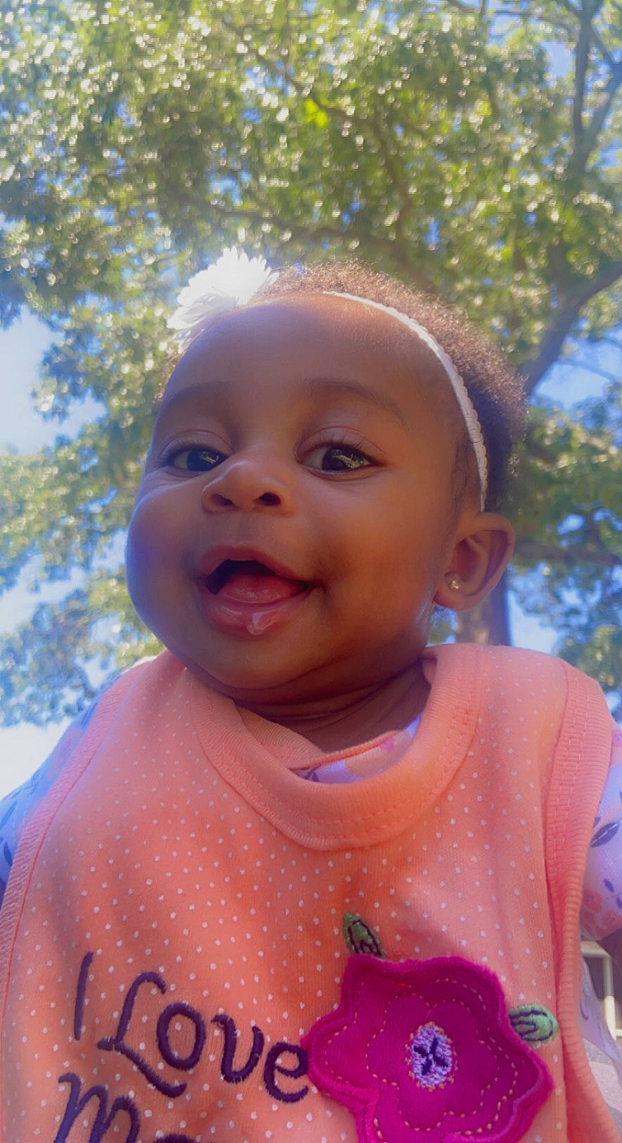 Kaydence joined the competition — help win amazing prizes! baby, baby_toddler_clothing, cheek, chin, face, facial_expression, grass, happy, iris, leaf, leisure, lip, mouth, nose, people_in_nature, person, pink, skin, smile, summer