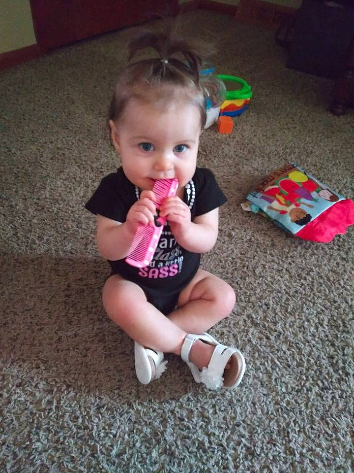 Kadence is registered to the contest to win money with this photo: arm, baby, baby_toddler_clothing, cheek, child, floor, flooring, fun, hair, happy, head, human_leg, knee, person, skin, sock, t_shirt, thigh, thumb, toddler