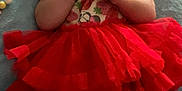Amethyst Jade joined the competition — help win amazing prizes! baby, infant, pacifier, headband, red_tutu, blanket, cute, sleeping, clothing, patterned_outfit, lying_down, soft_fabric, indoors, child, newborn, hands, legs, face, adorable, resting
