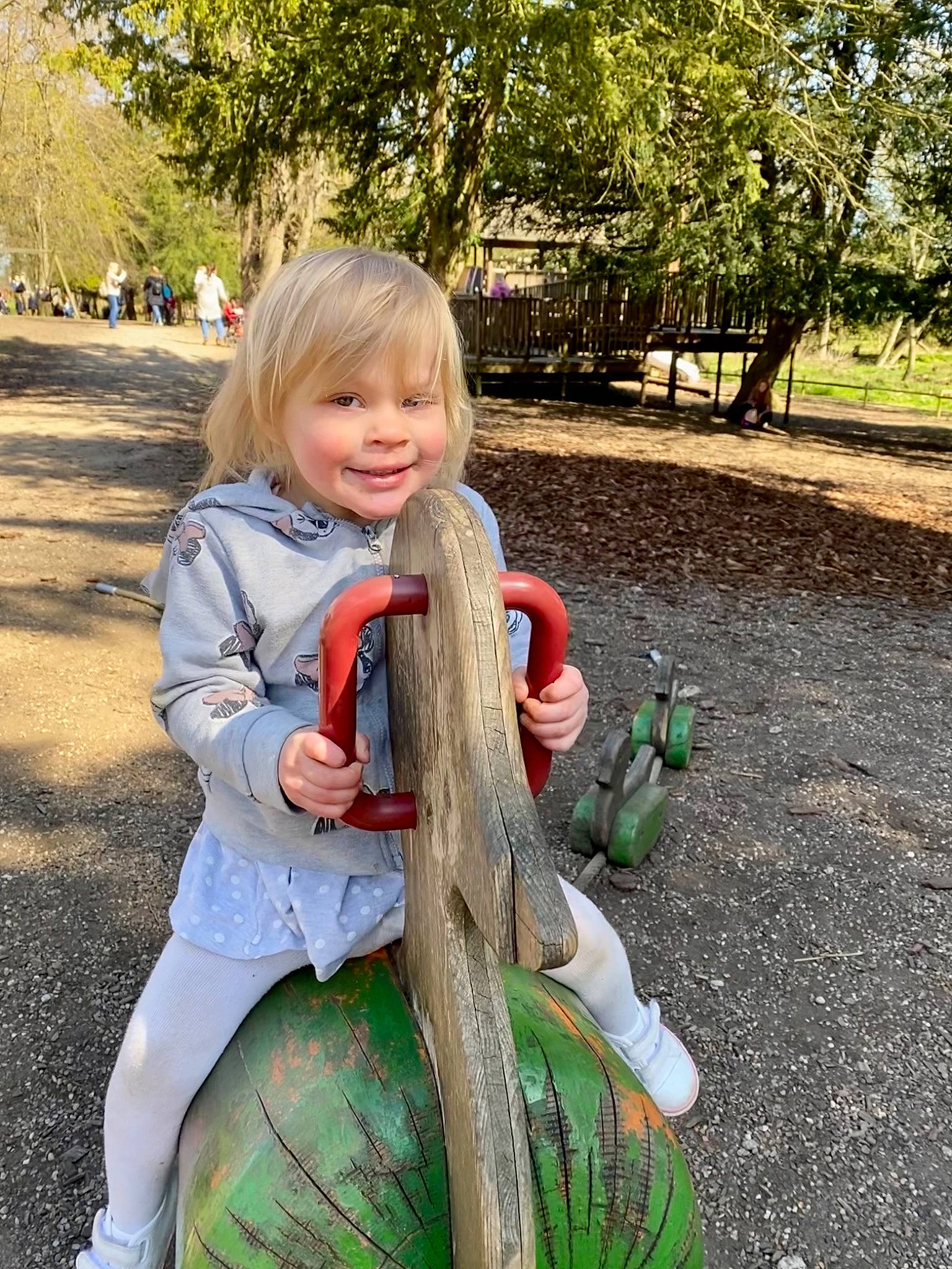 Evie-mae is registered to the contest to win money with this photo: botany, eye, fun, garden, grass, happy, hat, joy, lawn_ornament, leisure, mammal, people_in_nature, person, plant, recreation, reptile, sitting, smile, toddler, tree