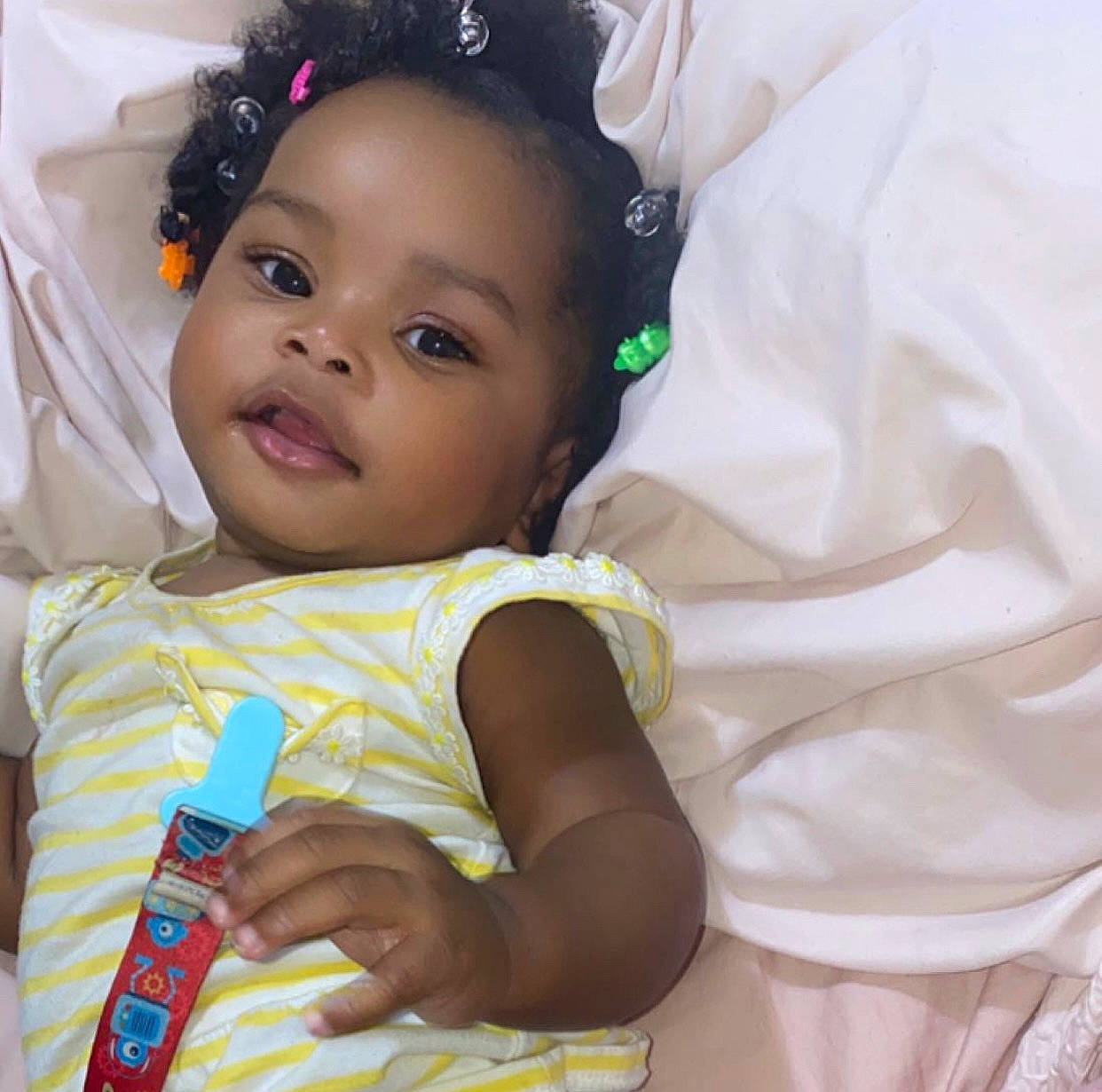 Cadence is registered to the contest to win money with this photo: baby, baby_toddler_clothing, cheek, child, comfort, eye, eyelash, flash_photography, fun, hair, hairstyle, hand, happy, head, iris, nose, person, skin, sleeve, smile