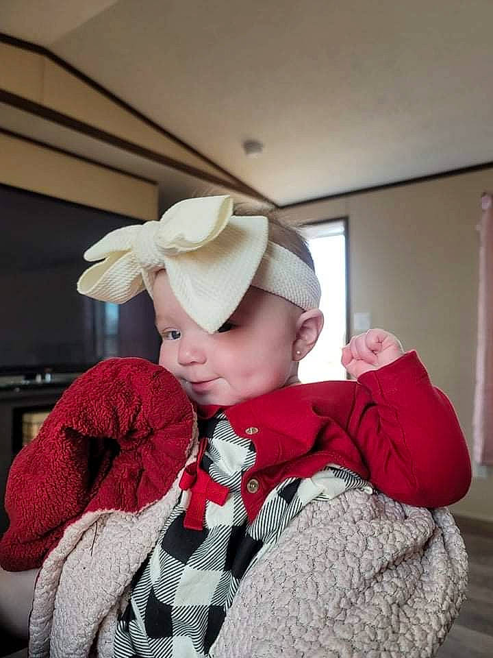 Remington joined the competition — help win amazing prizes! cap, comfort, costume, costume_hat, event, fashion_accessory, fashion_design, fun, fur, happy, headwear, pattern, person, room, sitting, sleeve, sun_hat, toddler, tradition, vacation