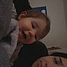 Rosealine is registered to the contest to win money with this photo: adult, baby, blanket, casual, child, closeup, cozy, expression, face, furniture, head, home, indoor, parent, person, portrait, relaxing, smile, toddler, warm