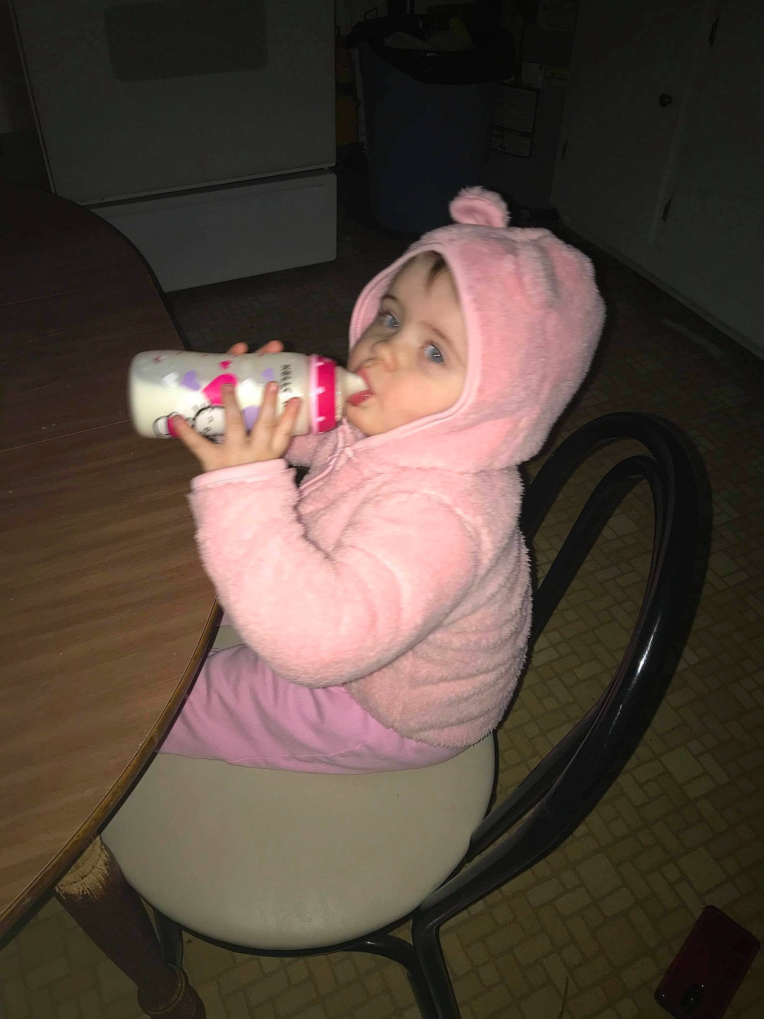 Rylee is registered to the contest to win money with this photo: baby, baby_bottle, child, drink, drinking, headwear, person, pink, toddler